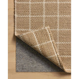 The Fletcher Collection from Chris Loves Julia x Loloi is a power-loomed jute rug with a large-scale grid pattern for an organic modern twist on a classic style. The rugs chunky texture and checkerboard-detailed lines are the refined details that Chris Loves Julia is known for, while the rugs natural palette allows for easy styling in any room. Amethyst Home provides interior design, new home construction design consulting, vintage area rugs, and lighting in the Charlotte metro area.