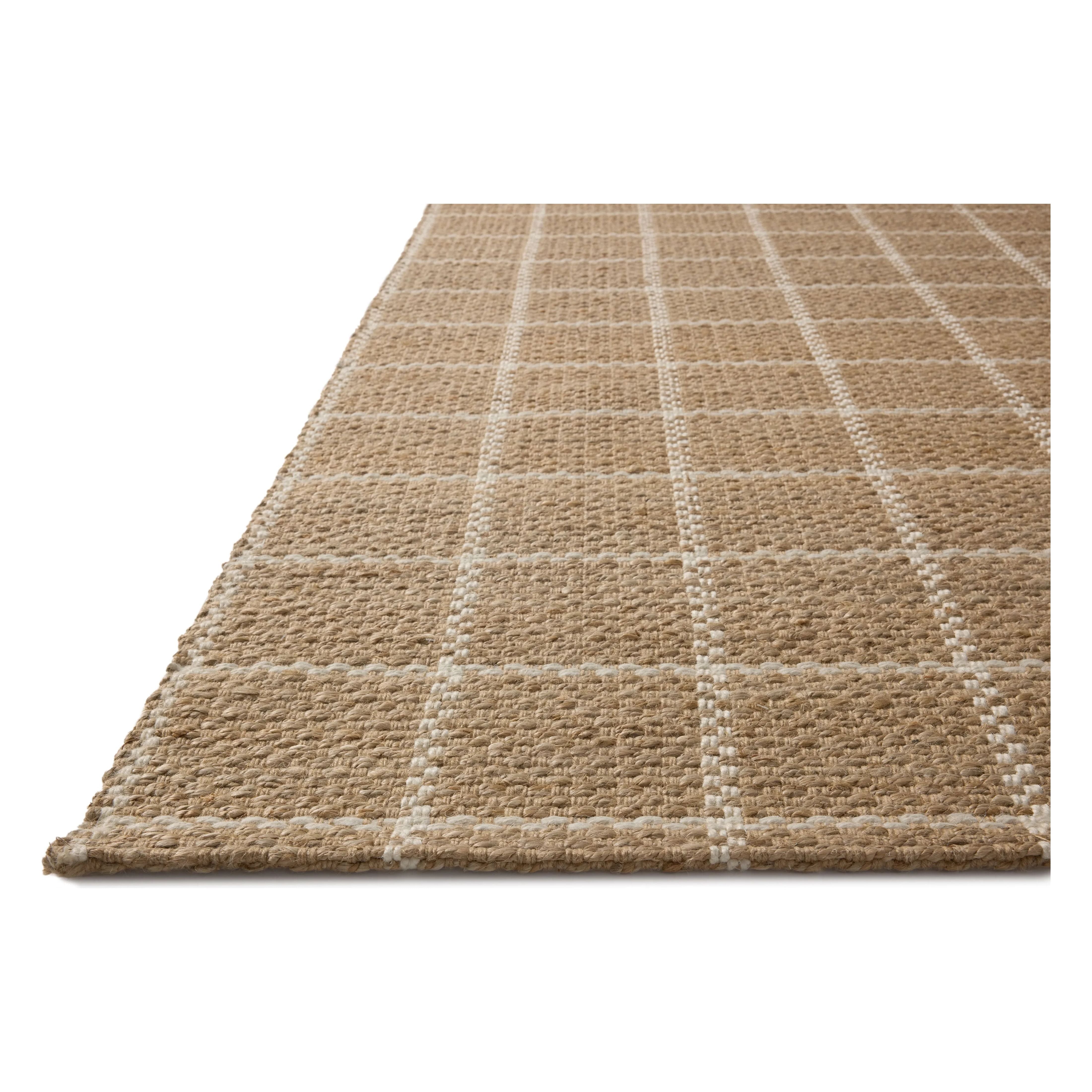 The Fletcher Collection from Chris Loves Julia x Loloi is a power-loomed jute rug with a large-scale grid pattern for an organic modern twist on a classic style. The rugs chunky texture and checkerboard-detailed lines are the refined details that Chris Loves Julia is known for, while the rugs natural palette allows for easy styling in any room. Amethyst Home provides interior design, new home construction design consulting, vintage area rugs, and lighting in the Laguna Beach metro area.
