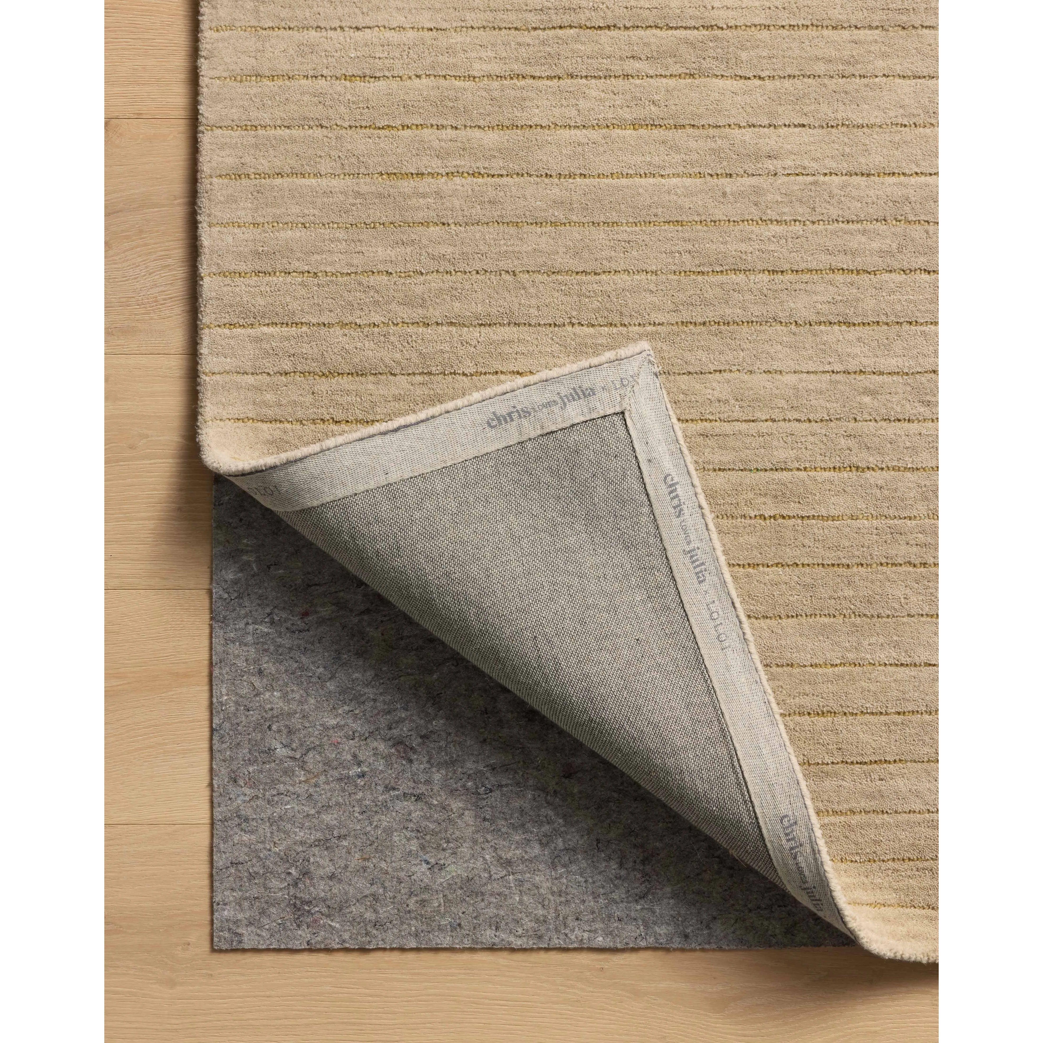 Featuring Chris Loves Julia × Loloi Henry Beige / Wheat Rug by Loloi at Amethyst Home. The Henry Collection from Chris Loves Julia x Loloi is a hand-tufted area rug that adds a touch of personality to a solid-colored design that can easily pair with other patterns in the room. These designs feature tufted stripes for subtle contrast and depth. The rugs woo. Amethyst Home provides interior design, new home construction design consulting, vintage area rugs, and lighting in the Scottsdale metro area.