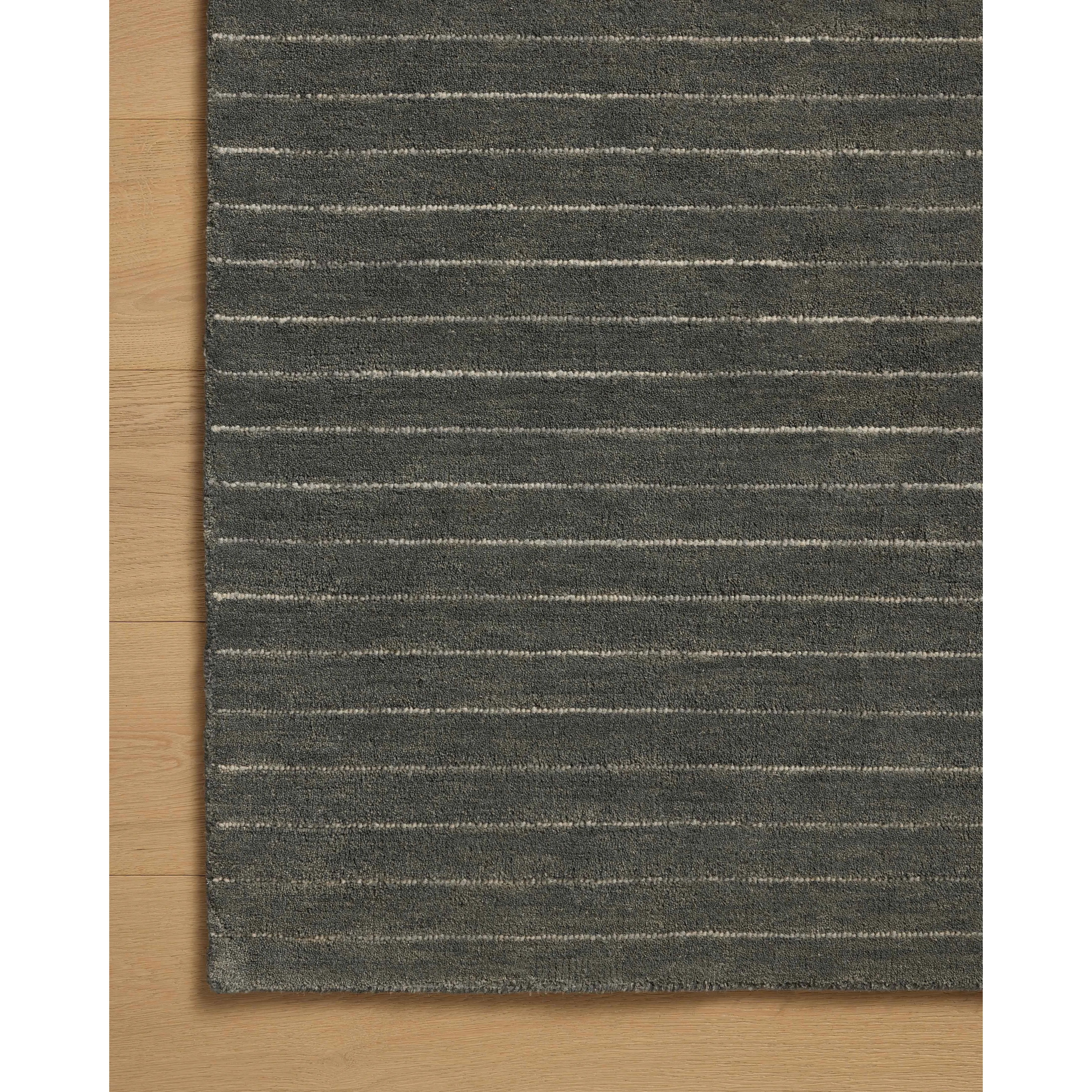 Featuring Chris Loves Julia × Loloi Henry Charcoal / Ivory Rug by Loloi at Amethyst Home. The Henry Collection from Chris Loves Julia x Loloi is a hand-tufted area rug that adds a touch of personality to a solid-colored design that can easily pair with other patterns in the room. These designs feature tufted stripes for subtle contrast and depth. The rugs . Amethyst Home provides interior design, new home construction design consulting, vintage area rugs, and lighting in the Scottsdale metro area.