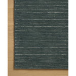 Featuring Chris Loves Julia × Loloi Henry Denim / Ivory Rug by Loloi at Amethyst Home. The Henry Collection from Chris Loves Julia x Loloi is a hand-tufted area rug that adds a touch of personality to a solid-colored design that can easily pair with other patterns in the room. These designs feature tufted stripes for subtle contrast and depth. The rugs wool. Amethyst Home provides interior design, new home construction design consulting, vintage area rugs, and lighting in the Nashville metro area.