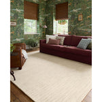 The Henry Collection from Chris Loves Julia x Loloi is a hand-tufted area rug that adds a touch of personality to a solid-colored design that can easily pair with other patterns in the room. These designs feature tufted stripes for subtle contrast and depth. The rugs wool pile is thick and satisfying to walk on, with gently nuanced color variation. Amethyst Home provides interior design, new home construction design consulting, vintage area rugs, and lighting in the Alpharetta metro area.