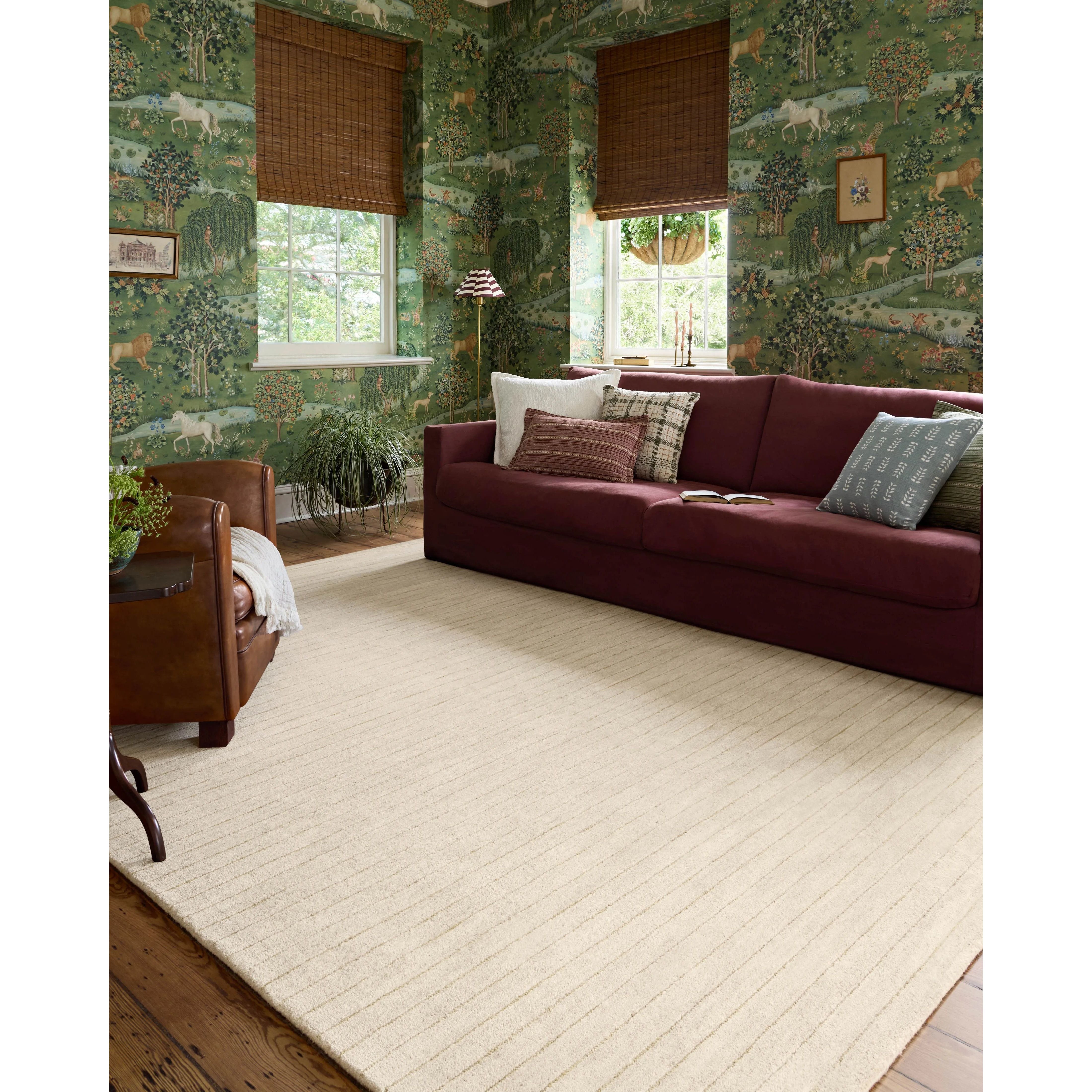The Henry Collection from Chris Loves Julia x Loloi is a hand-tufted area rug that adds a touch of personality to a solid-colored design that can easily pair with other patterns in the room. These designs feature tufted stripes for subtle contrast and depth. The rugs wool pile is thick and satisfying to walk on, with gently nuanced color variation. Amethyst Home provides interior design, new home construction design consulting, vintage area rugs, and lighting in the Alpharetta metro area.