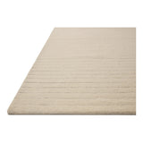 The Henry Collection from Chris Loves Julia x Loloi is a hand-tufted area rug that adds a touch of personality to a solid-colored design that can easily pair with other patterns in the room. These designs feature tufted stripes for subtle contrast and depth. The rugs wool pile is thick and satisfying to walk on, with gently nuanced color variation. Amethyst Home provides interior design, new home construction design consulting, vintage area rugs, and lighting in the Kansas City metro area.