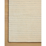 The Henry Collection from Chris Loves Julia x Loloi is a hand-tufted area rug that adds a touch of personality to a solid-colored design that can easily pair with other patterns in the room. These designs feature tufted stripes for subtle contrast and depth. The rugs wool pile is thick and satisfying to walk on, with gently nuanced color variation. Amethyst Home provides interior design, new home construction design consulting, vintage area rugs, and lighting in the Nashville metro area.