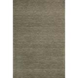 The Henry Collection from Chris Loves Julia x Loloi is a hand-tufted area rug that adds a touch of personality to a solid-colored design that can easily pair with other patterns in the room. These designs feature tufted stripes for subtle contrast and depth. The rugs wool pile is thick and satisfying to walk on, with gently nuanced color variation. Amethyst Home provides interior design, new home construction design consulting, vintage area rugs, and lighting in the Alpharetta metro area.