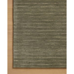 The Henry Collection from Chris Loves Julia x Loloi is a hand-tufted area rug that adds a touch of personality to a solid-colored design that can easily pair with other patterns in the room. These designs feature tufted stripes for subtle contrast and depth. The rugs wool pile is thick and satisfying to walk on, with gently nuanced color variation. Amethyst Home provides interior design, new home construction design consulting, vintage area rugs, and lighting in the Charlotte metro area.