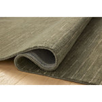 The Henry Collection from Chris Loves Julia x Loloi is a hand-tufted area rug that adds a touch of personality to a solid-colored design that can easily pair with other patterns in the room. These designs feature tufted stripes for subtle contrast and depth. The rugs wool pile is thick and satisfying to walk on, with gently nuanced color variation. Amethyst Home provides interior design, new home construction design consulting, vintage area rugs, and lighting in the Nashville metro area.