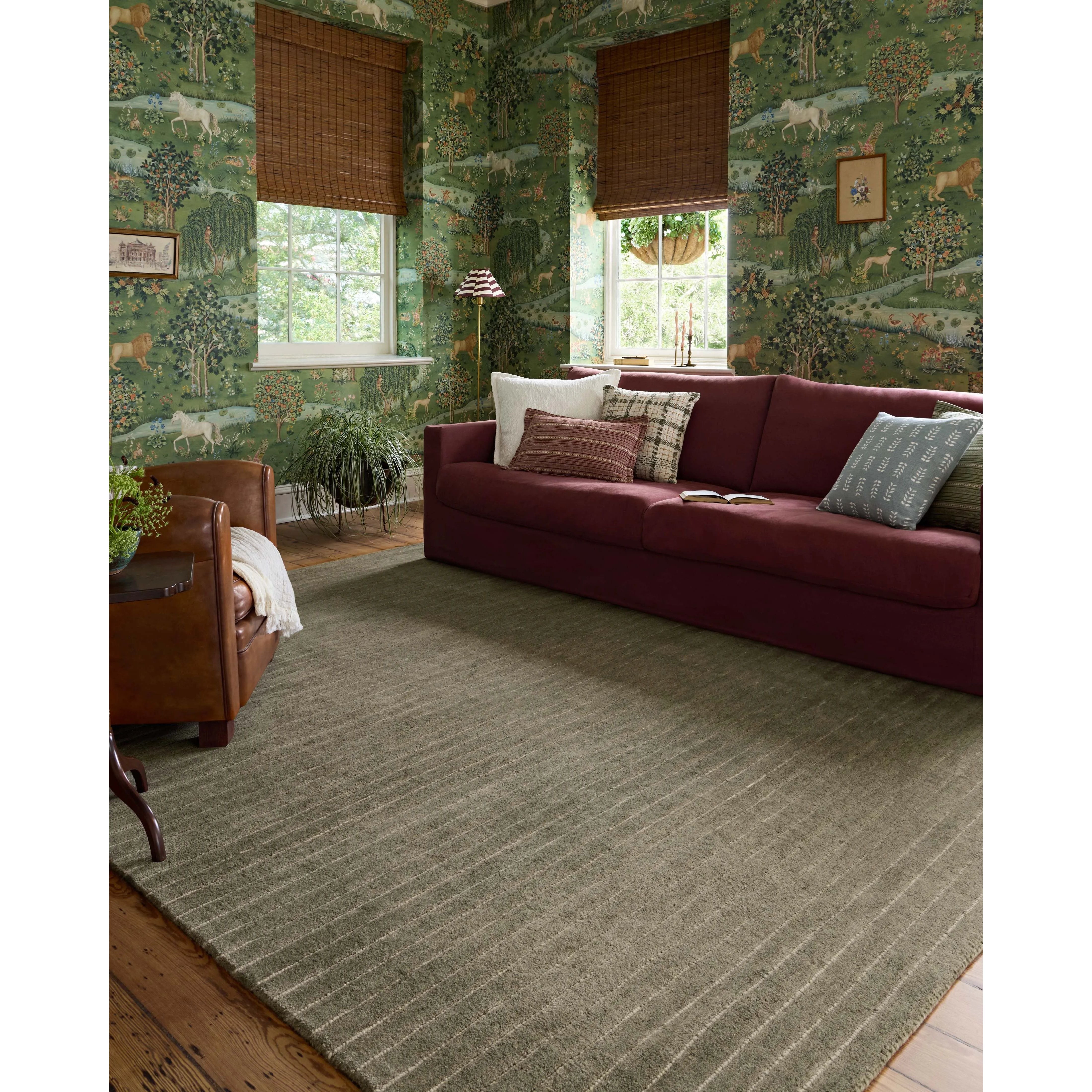 The Henry Collection from Chris Loves Julia x Loloi is a hand-tufted area rug that adds a touch of personality to a solid-colored design that can easily pair with other patterns in the room. These designs feature tufted stripes for subtle contrast and depth. The rugs wool pile is thick and satisfying to walk on, with gently nuanced color variation. Amethyst Home provides interior design, new home construction design consulting, vintage area rugs, and lighting in the Tampa metro area.