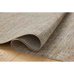 The Ida Collection from Chris Loves Julia x Loloi is a vintage-inspired area rug with a soft, subtly textured pile similar to hand-knotted rugs. The rugs gentle distressing creates a timeless look, while its durability and earthy colorways make it a great choice for the busiest rooms of the home, especially living rooms, kitchens, and hallways. Amethyst Home provides interior design, new home construction design consulting, vintage area rugs, and lighting in the Houston metro area.