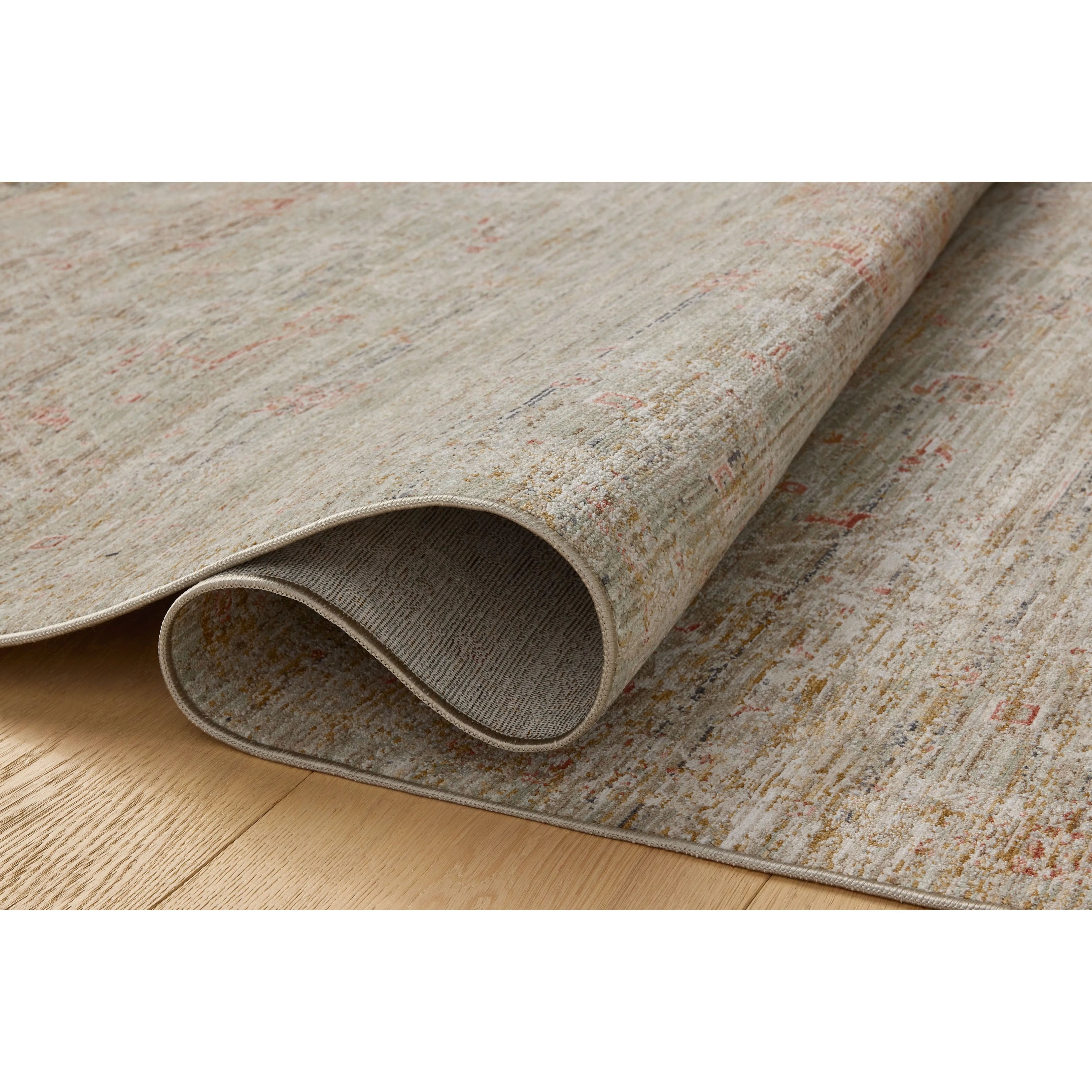 The Ida Collection from Chris Loves Julia x Loloi is a vintage-inspired area rug with a soft, subtly textured pile similar to hand-knotted rugs. The rugs gentle distressing creates a timeless look, while its durability and earthy colorways make it a great choice for the busiest rooms of the home, especially living rooms, kitchens, and hallways. Amethyst Home provides interior design, new home construction design consulting, vintage area rugs, and lighting in the Houston metro area.