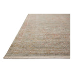 The Ida Collection from Chris Loves Julia x Loloi is a vintage-inspired area rug with a soft, subtly textured pile similar to hand-knotted rugs. The rugs gentle distressing creates a timeless look, while its durability and earthy colorways make it a great choice for the busiest rooms of the home, especially living rooms, kitchens, and hallways. Amethyst Home provides interior design, new home construction design consulting, vintage area rugs, and lighting in the Miami metro area.