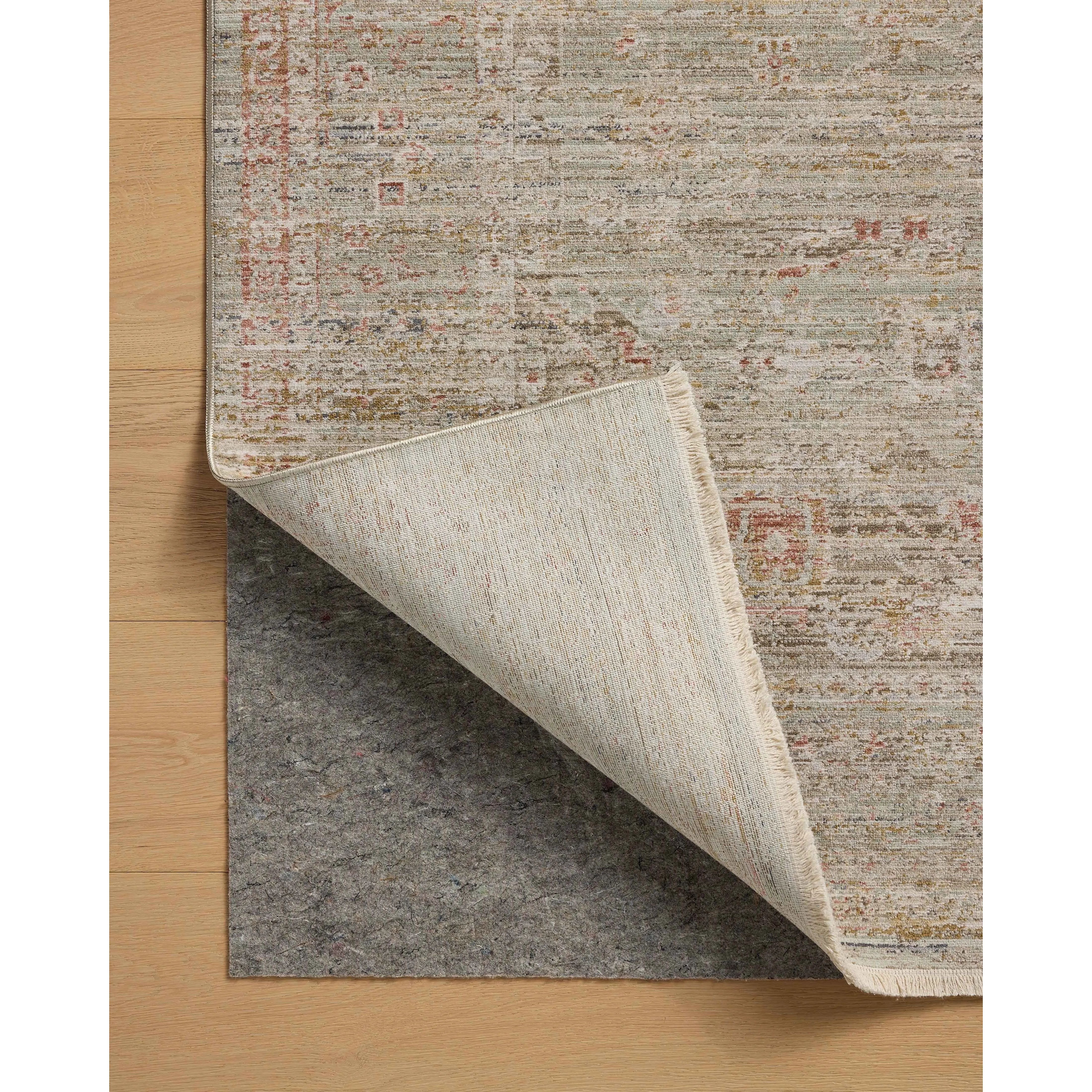 The Ida Collection from Chris Loves Julia x Loloi is a vintage-inspired area rug with a soft, subtly textured pile similar to hand-knotted rugs. The rugs gentle distressing creates a timeless look, while its durability and earthy colorways make it a great choice for the busiest rooms of the home, especially living rooms, kitchens, and hallways. Amethyst Home provides interior design, new home construction design consulting, vintage area rugs, and lighting in the Winter Garden metro area.