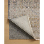 The Ida Collection from Chris Loves Julia x Loloi is a vintage-inspired area rug with a soft, subtly textured pile similar to hand-knotted rugs. The rugs gentle distressing creates a timeless look, while its durability and earthy colorways make it a great choice for the busiest rooms of the home, especially living rooms, kitchens, and hallways. Amethyst Home provides interior design, new home construction design consulting, vintage area rugs, and lighting in the Los Angeles metro area.