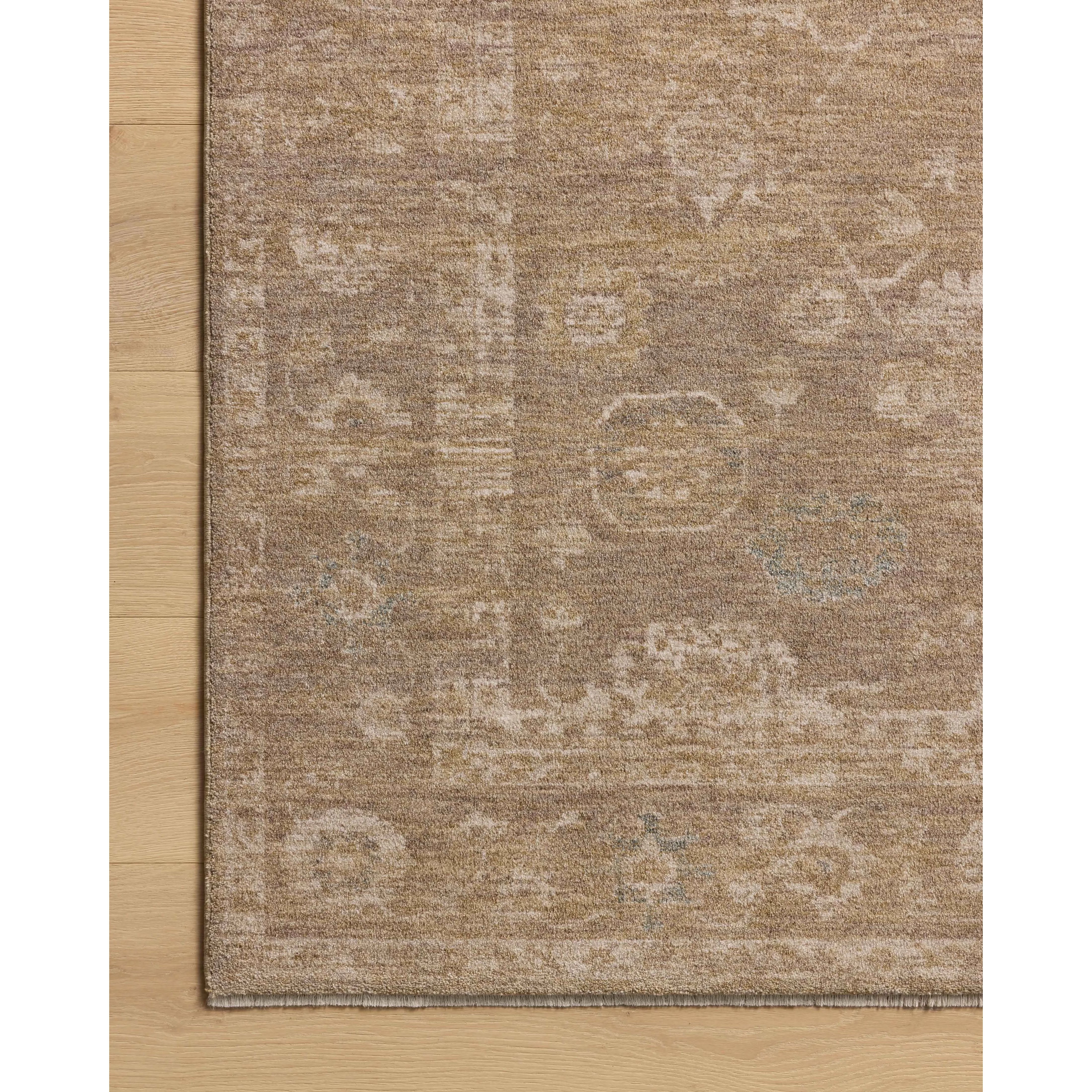 The Louisa Collection is a serene area rug based on beautiful, traditional Turkish designs updated in calm colorways by Chris Loves Julia in collaboration with Loloi. Pale blues, creams, and browns create a sense of softness, but so does the rugs pile, which is made of easy-to-clean, velvety polyester. Amethyst Home provides interior design, new home construction design consulting, vintage area rugs, and lighting in the Dallas metro area.