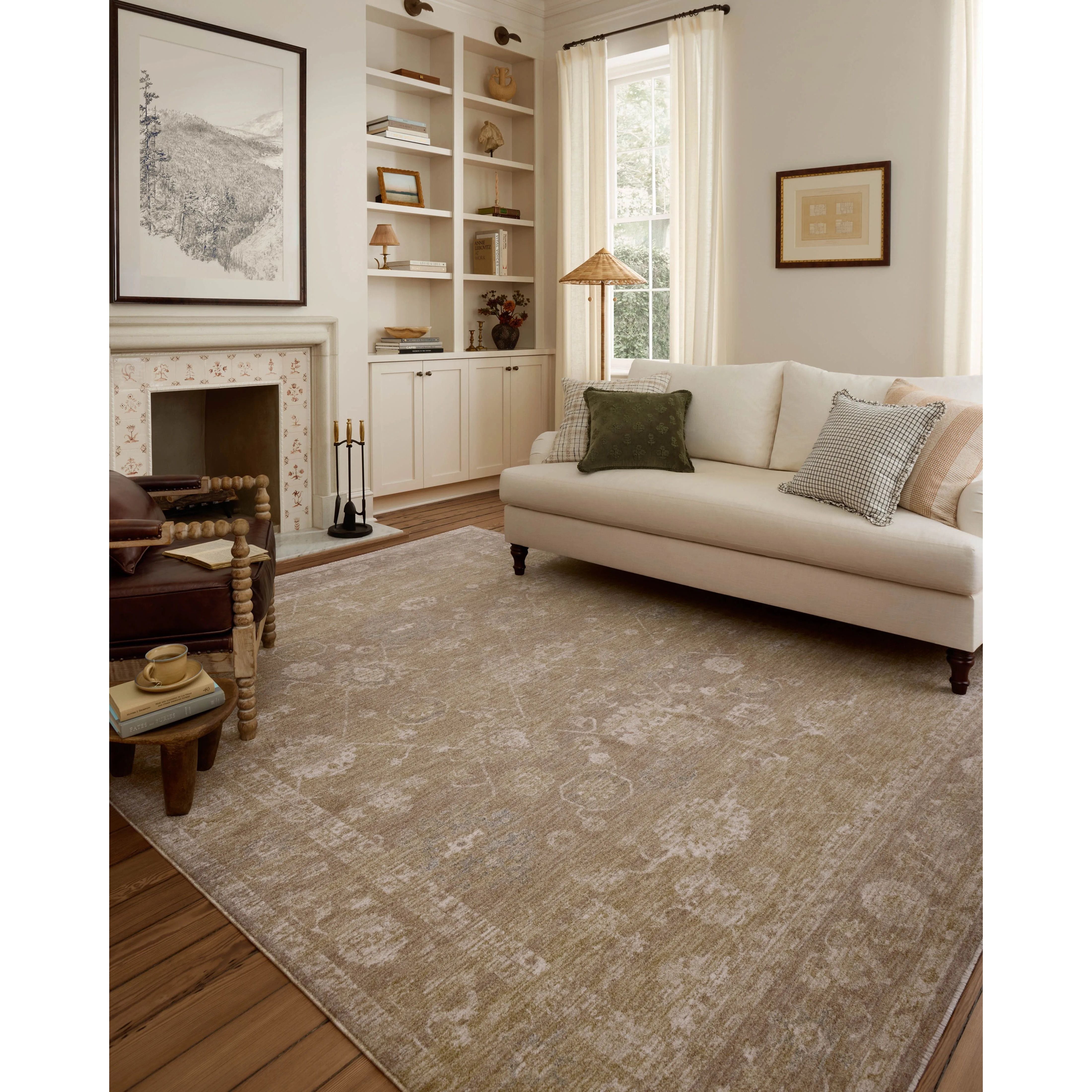 The Louisa Collection is a serene area rug based on beautiful, traditional Turkish designs updated in calm colorways by Chris Loves Julia in collaboration with Loloi. Pale blues, creams, and browns create a sense of softness, but so does the rugs pile, which is made of easy-to-clean, velvety polyester. Amethyst Home provides interior design, new home construction design consulting, vintage area rugs, and lighting in the Park City metro area.