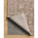 The Louisa Collection is a serene area rug based on beautiful, traditional Turkish designs updated in calm colorways by Chris Loves Julia in collaboration with Loloi. Pale blues, creams, and browns create a sense of softness, but so does the rugs pile, which is made of easy-to-clean, velvety polyester. Amethyst Home provides interior design, new home construction design consulting, vintage area rugs, and lighting in the Dallas metro area.