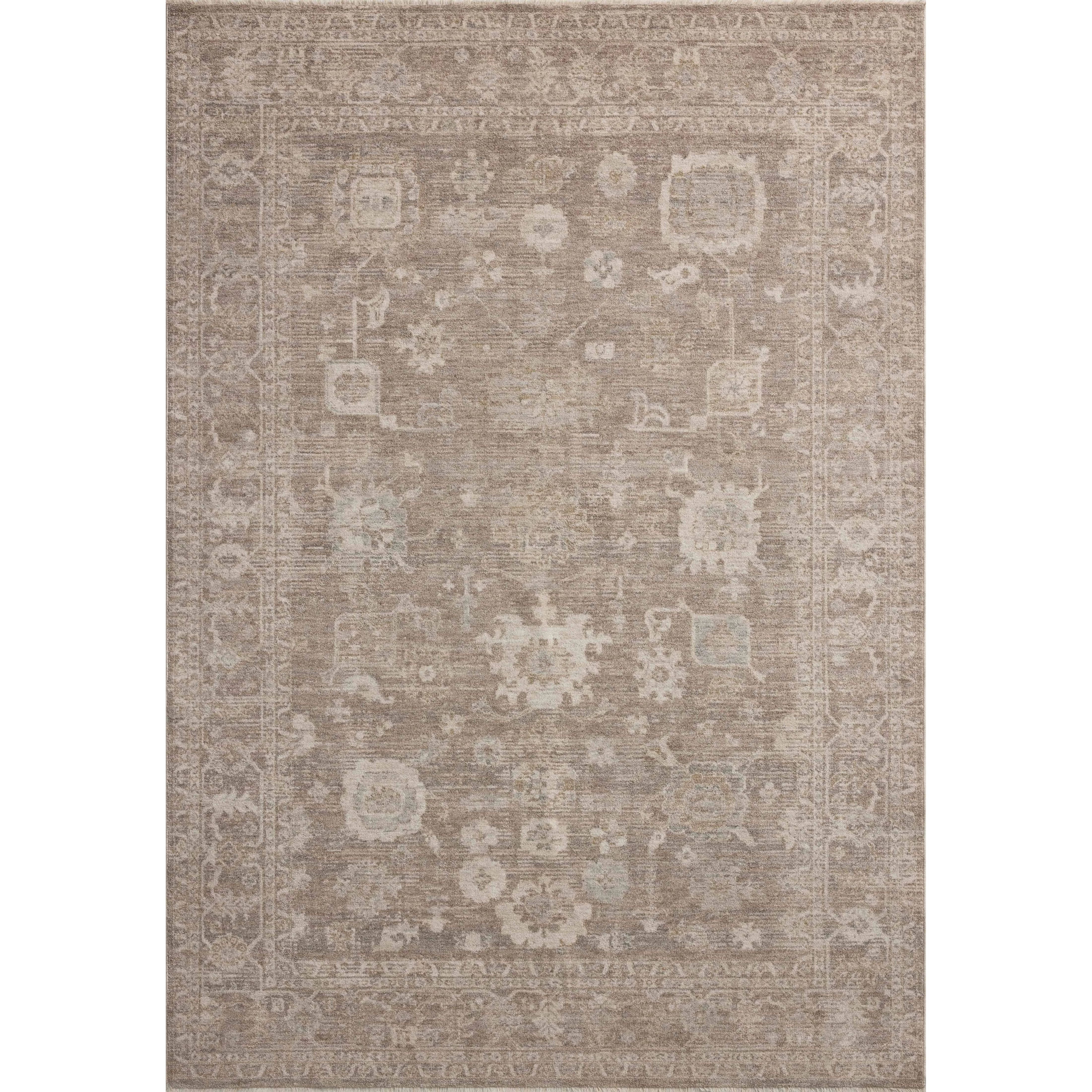 The Louisa Collection is a serene area rug based on beautiful, traditional Turkish designs updated in calm colorways by Chris Loves Julia in collaboration with Loloi. Pale blues, creams, and browns create a sense of softness, but so does the rugs pile, which is made of easy-to-clean, velvety polyester. Amethyst Home provides interior design, new home construction design consulting, vintage area rugs, and lighting in the Laguna Beach metro area.