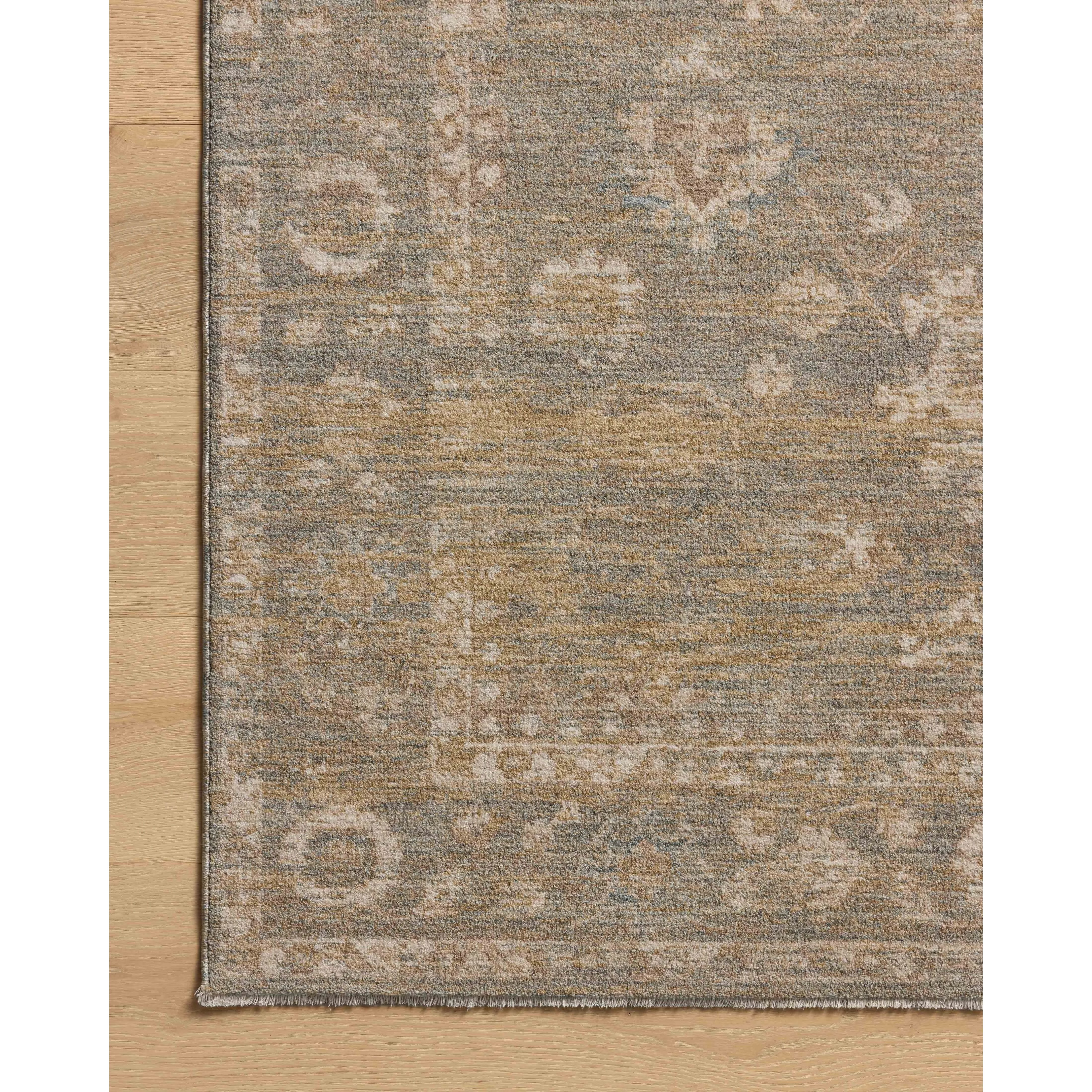 The Louisa Collection is a serene area rug based on beautiful, traditional Turkish designs updated in calm colorways by Chris Loves Julia in collaboration with Loloi. Pale blues, creams, and browns create a sense of softness, but so does the rugs pile, which is made of easy-to-clean, velvety polyester. Amethyst Home provides interior design, new home construction design consulting, vintage area rugs, and lighting in the Los Angeles metro area.