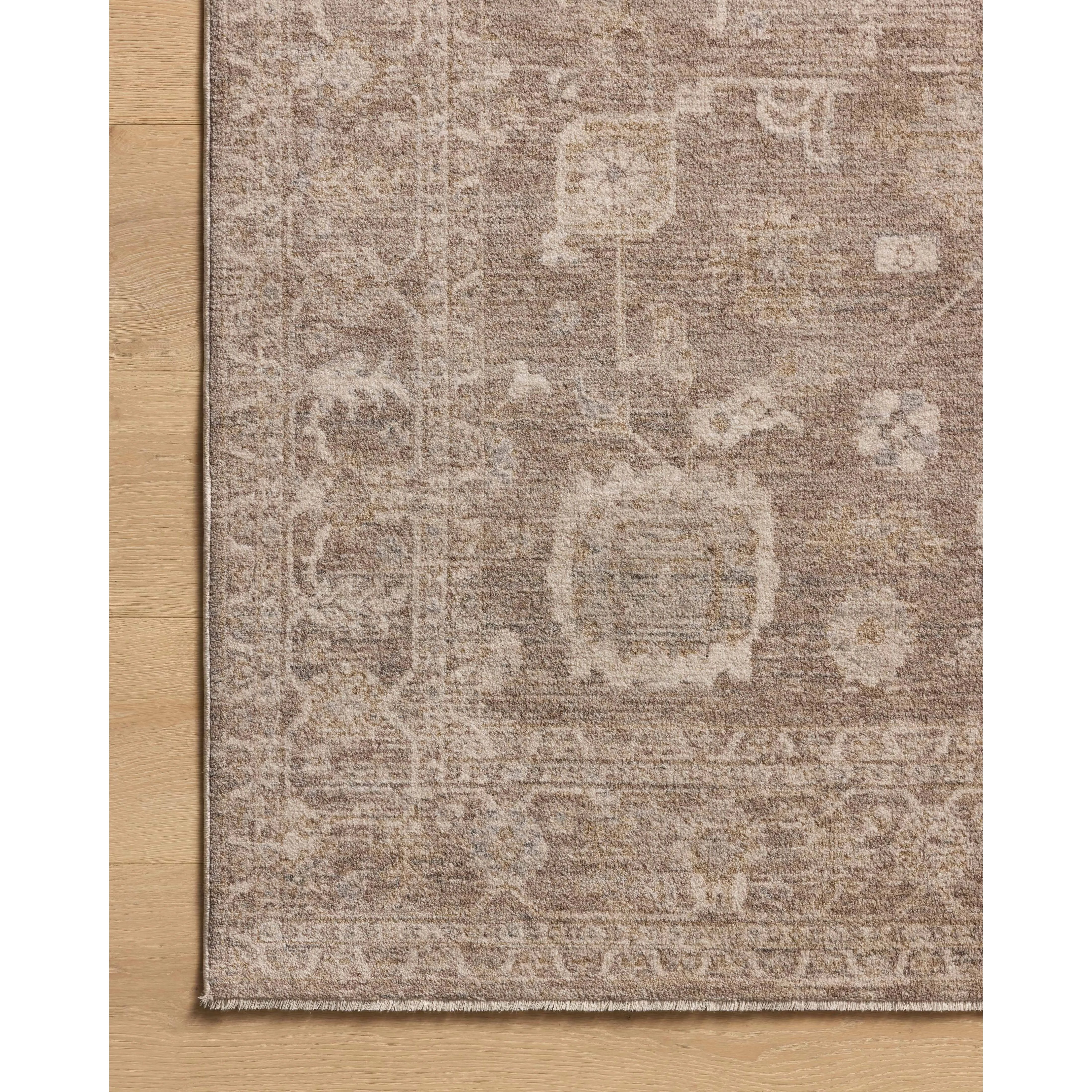 The Louisa Collection is a serene area rug based on beautiful, traditional Turkish designs updated in calm colorways by Chris Loves Julia in collaboration with Loloi. Pale blues, creams, and browns create a sense of softness, but so does the rugs pile, which is made of easy-to-clean, velvety polyester. Amethyst Home provides interior design, new home construction design consulting, vintage area rugs, and lighting in the Omaha metro area.