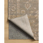 The Louisa Collection is a serene area rug based on beautiful, traditional Turkish designs updated in calm colorways by Chris Loves Julia in collaboration with Loloi. Pale blues, creams, and browns create a sense of softness, but so does the rugs pile, which is made of easy-to-clean, velvety polyester. Amethyst Home provides interior design, new home construction design consulting, vintage area rugs, and lighting in the Winter Garden metro area.