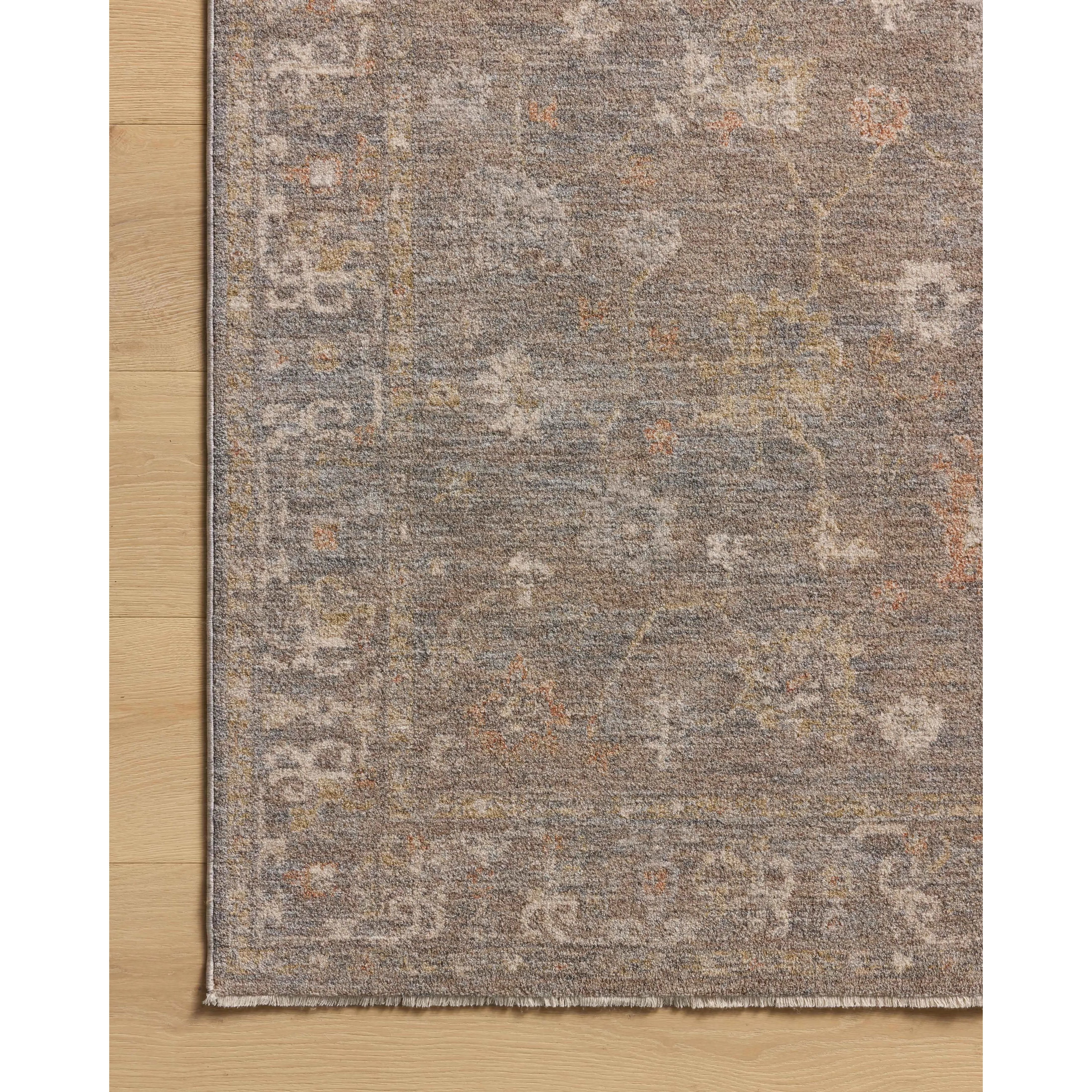 The Louisa Collection is a serene area rug based on beautiful, traditional Turkish designs updated in calm colorways by Chris Loves Julia in collaboration with Loloi. Pale blues, creams, and browns create a sense of softness, but so does the rugs pile, which is made of easy-to-clean, velvety polyester. Amethyst Home provides interior design, new home construction design consulting, vintage area rugs, and lighting in the Boston metro area.