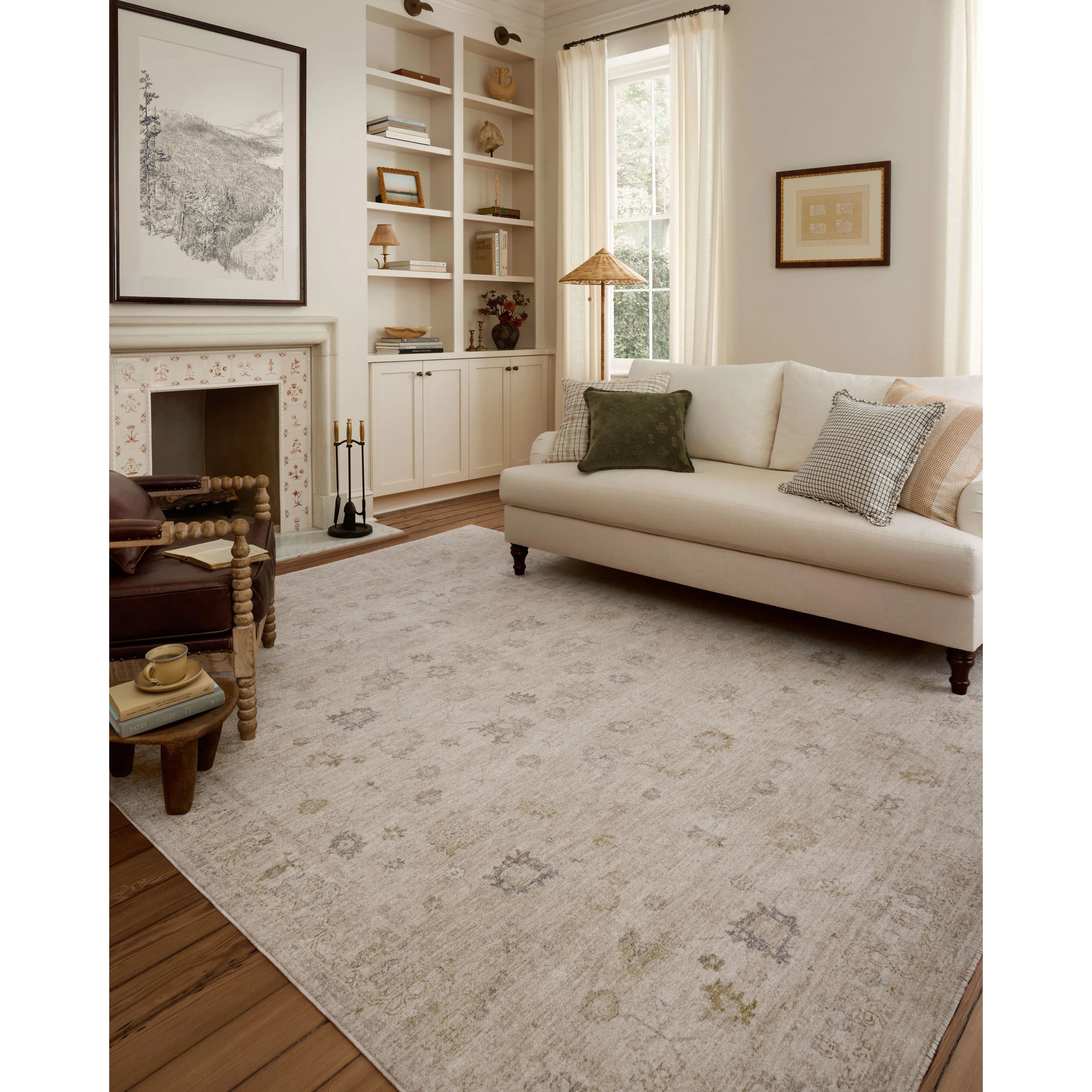 The Louisa Collection is a serene area rug based on beautiful, traditional Turkish designs updated in calm colorways by Chris Loves Julia in collaboration with Loloi. Pale blues, creams, and browns create a sense of softness, but so does the rugs pile, which is made of easy-to-clean, velvety polyester. Amethyst Home provides interior design, new home construction design consulting, vintage area rugs, and lighting in the Salt Lake City metro area.