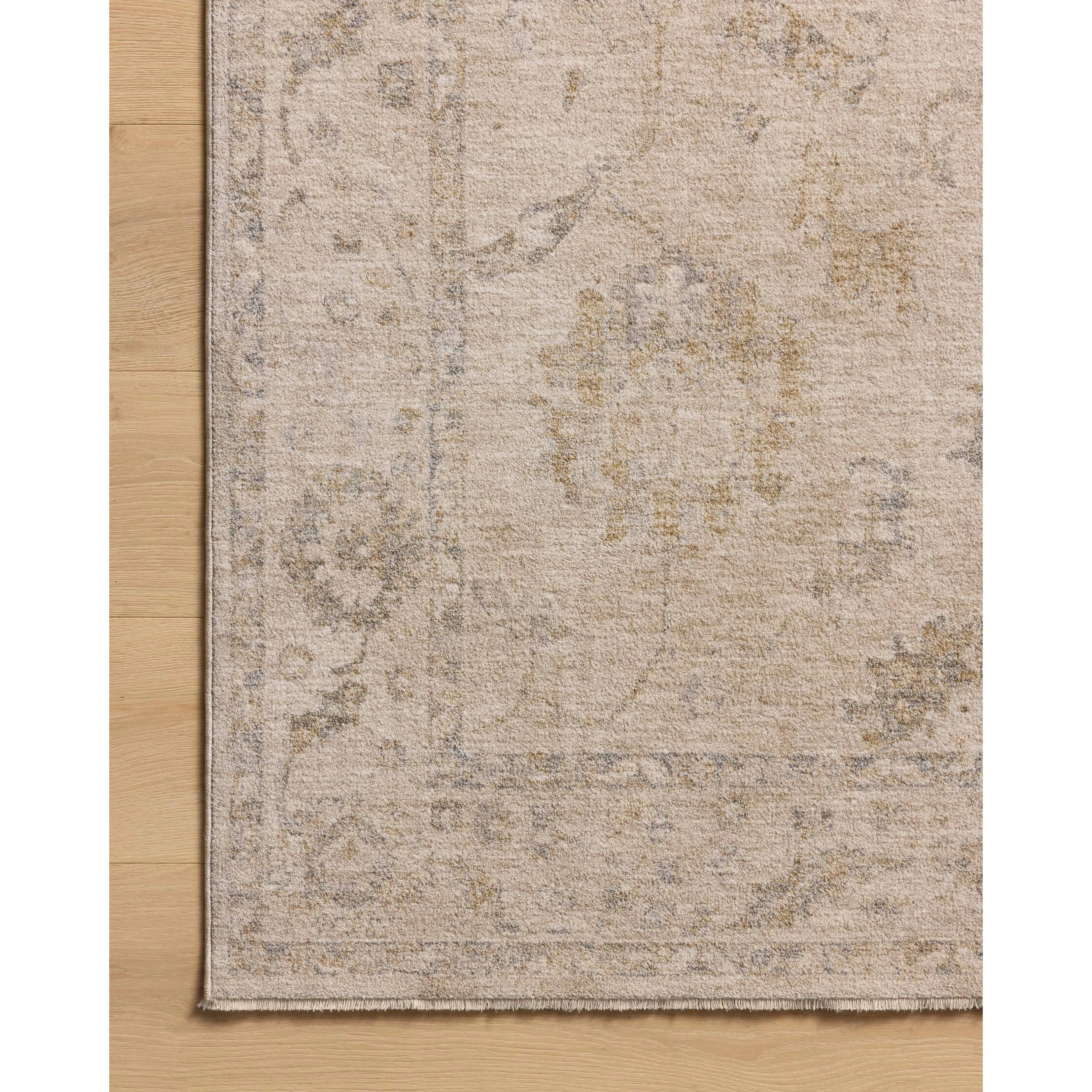 The Louisa Collection is a serene area rug based on beautiful, traditional Turkish designs updated in calm colorways by Chris Loves Julia in collaboration with Loloi. Pale blues, creams, and browns create a sense of softness, but so does the rugs pile, which is made of easy-to-clean, velvety polyester. Amethyst Home provides interior design, new home construction design consulting, vintage area rugs, and lighting in the Dallas metro area.