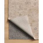 The Louisa Collection is a serene area rug based on beautiful, traditional Turkish designs updated in calm colorways by Chris Loves Julia in collaboration with Loloi. Pale blues, creams, and browns create a sense of softness, but so does the rugs pile, which is made of easy-to-clean, velvety polyester. Amethyst Home provides interior design, new home construction design consulting, vintage area rugs, and lighting in the Alpharetta metro area.
