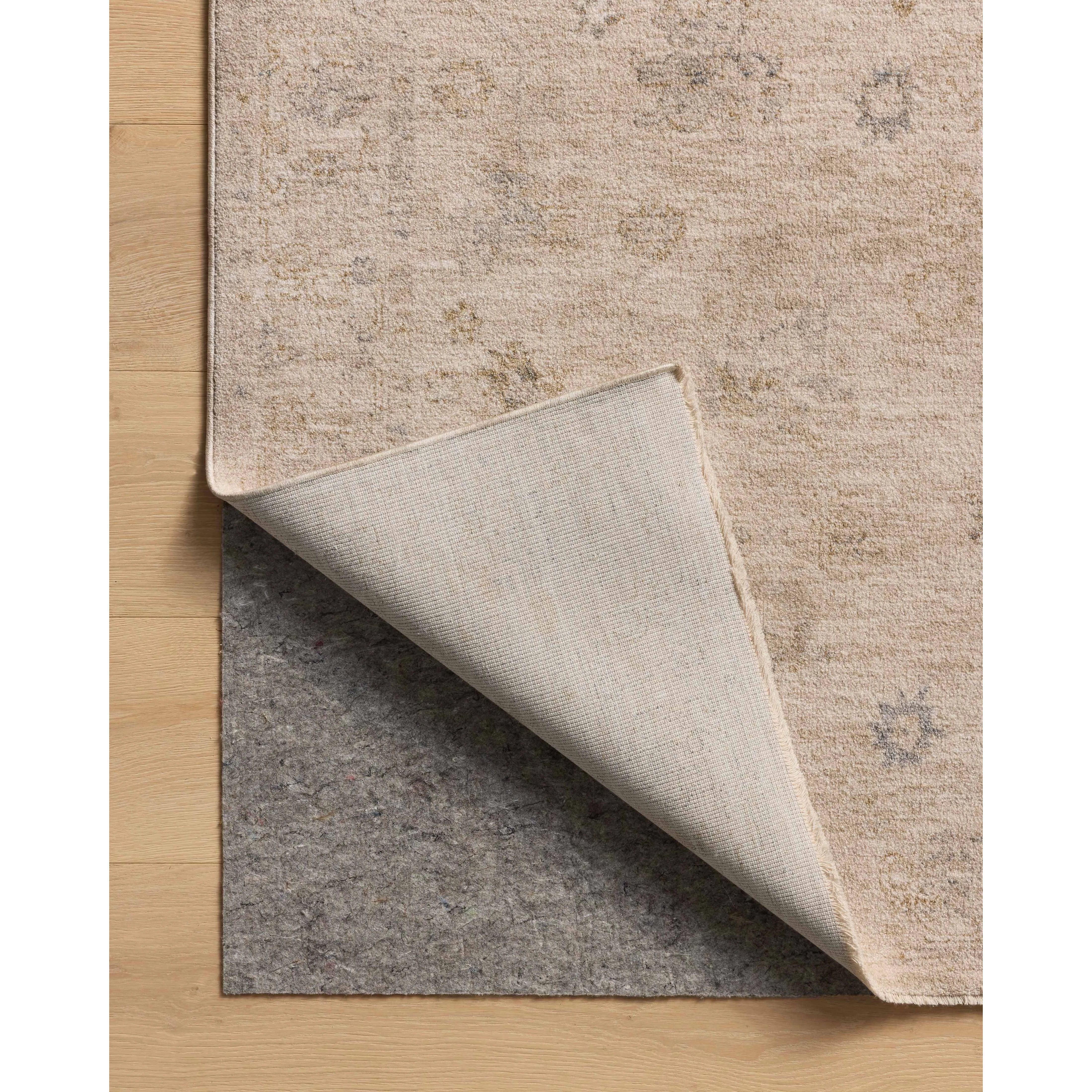 The Louisa Collection is a serene area rug based on beautiful, traditional Turkish designs updated in calm colorways by Chris Loves Julia in collaboration with Loloi. Pale blues, creams, and browns create a sense of softness, but so does the rugs pile, which is made of easy-to-clean, velvety polyester. Amethyst Home provides interior design, new home construction design consulting, vintage area rugs, and lighting in the Alpharetta metro area.