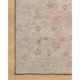The Louisa Collection is a serene area rug based on beautiful, traditional Turkish designs updated in calm colorways by Chris Loves Julia in collaboration with Loloi. Pale blues, creams, and browns create a sense of softness, but so does the rugs pile, which is made of easy-to-clean, velvety polyester. Amethyst Home provides interior design, new home construction design consulting, vintage area rugs, and lighting in the Tampa metro area.