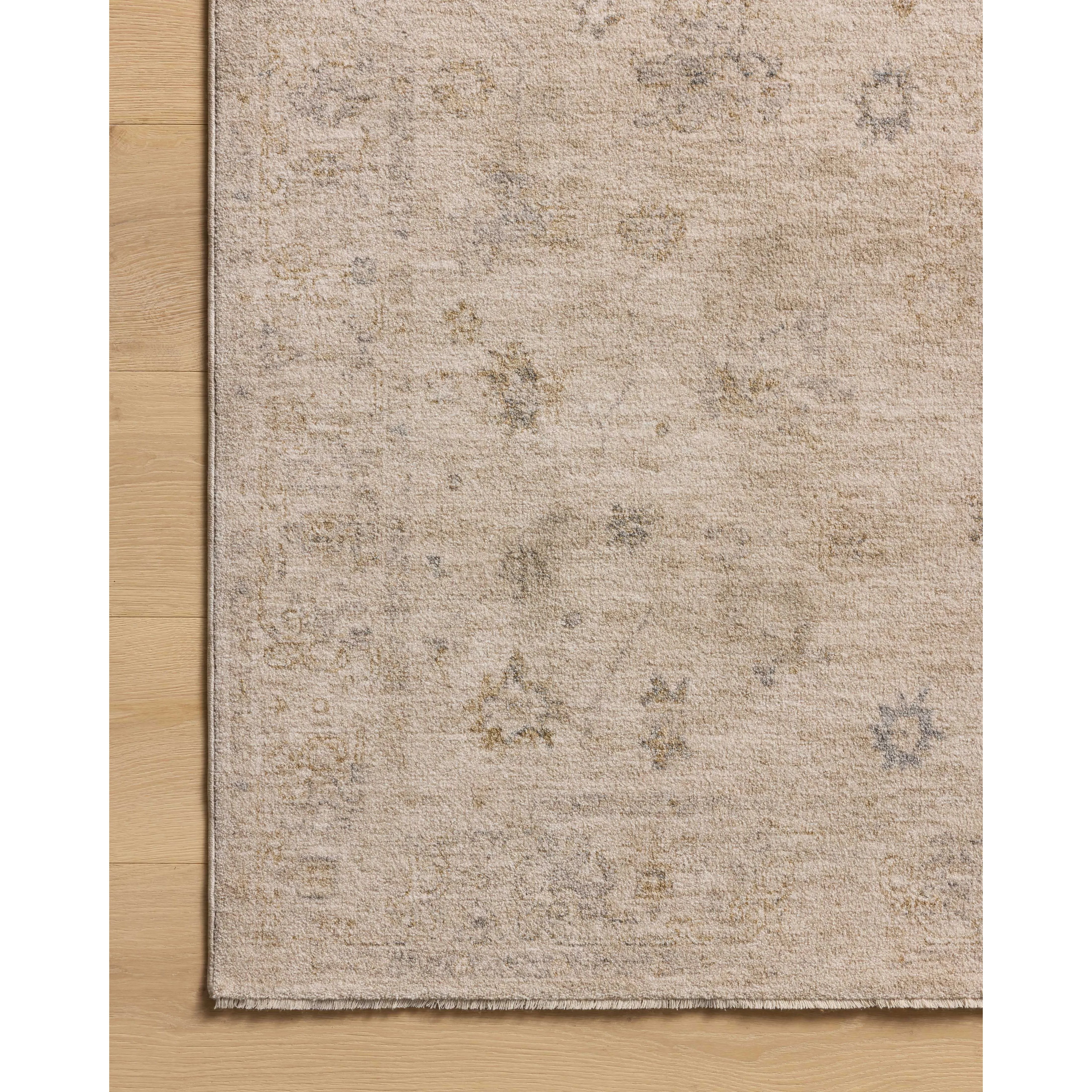 The Louisa Collection is a serene area rug based on beautiful, traditional Turkish designs updated in calm colorways by Chris Loves Julia in collaboration with Loloi. Pale blues, creams, and browns create a sense of softness, but so does the rugs pile, which is made of easy-to-clean, velvety polyester. Amethyst Home provides interior design, new home construction design consulting, vintage area rugs, and lighting in the Tampa metro area.