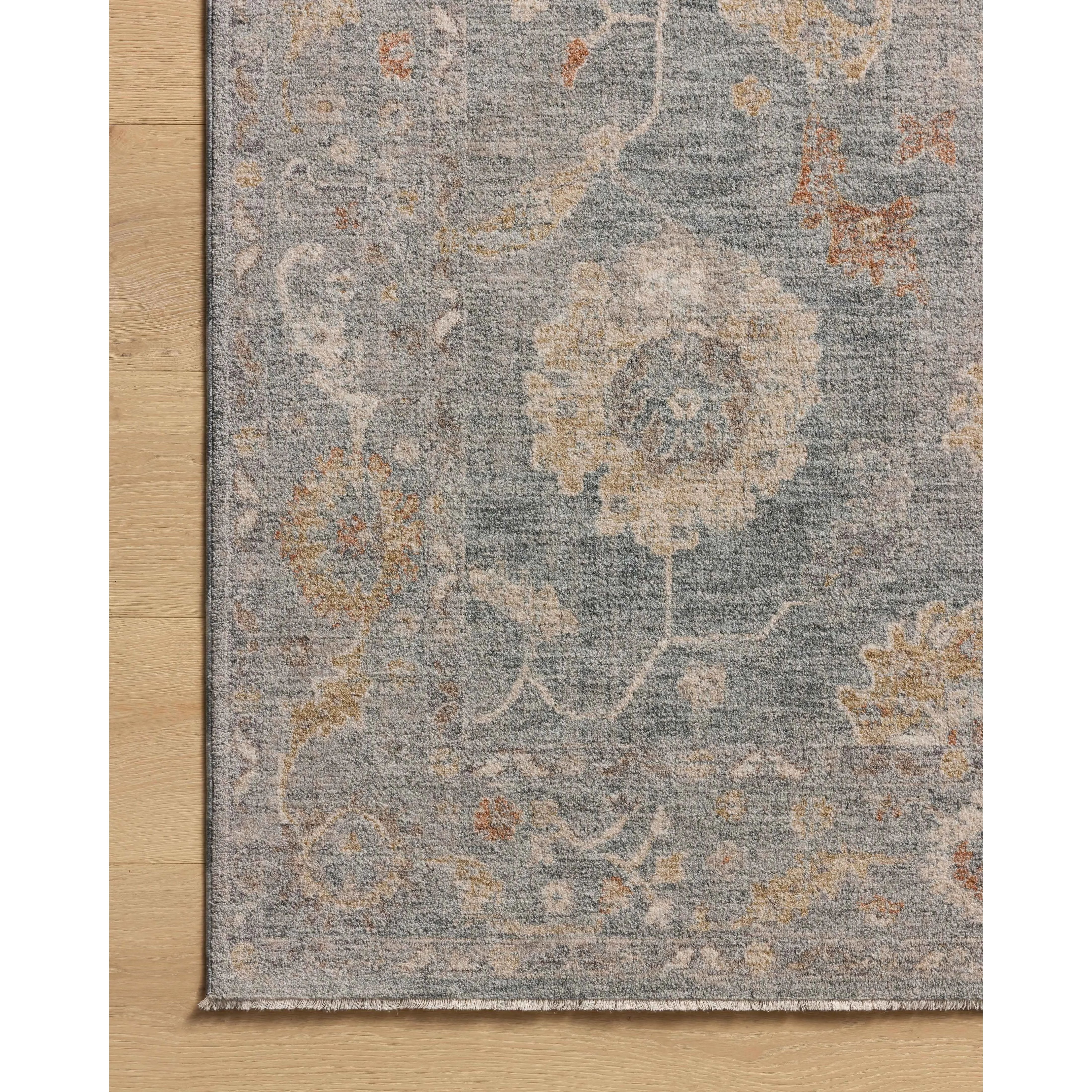 The Louisa Collection is a serene area rug based on beautiful, traditional Turkish designs updated in calm colorways by Chris Loves Julia in collaboration with Loloi. Pale blues, creams, and browns create a sense of softness, but so does the rugs pile, which is made of easy-to-clean, velvety polyester. Amethyst Home provides interior design, new home construction design consulting, vintage area rugs, and lighting in the Alpharetta metro area.
