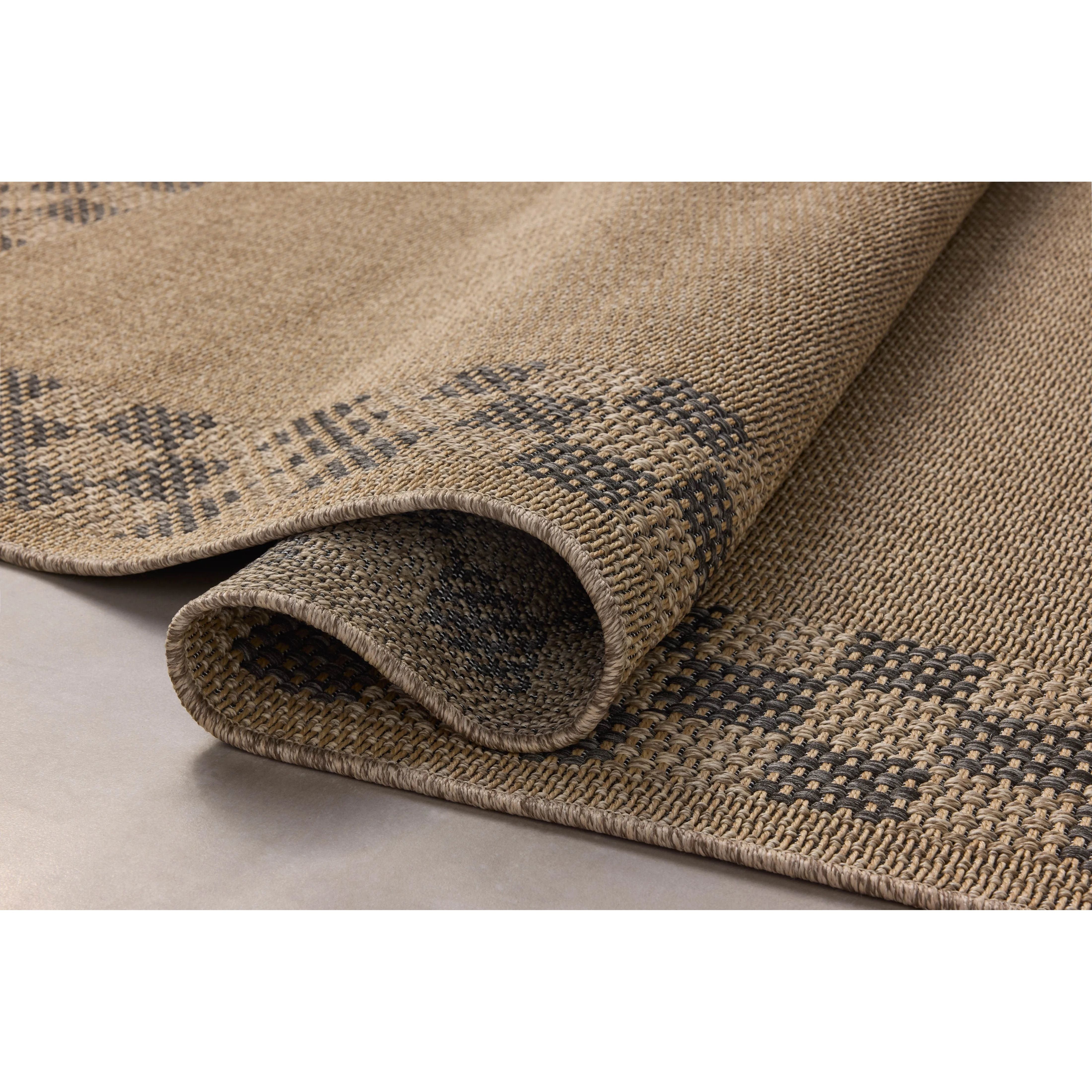 The Providence Collection is an indoor/outdoor rug with a woven-style design by Chris Loves Julia x Loloi. Providence is made of extra durable power-loomed polyester for versatile styling in patios, mudrooms, dining rooms, hallways, or more. Amethyst Home provides interior design, new home construction design consulting, vintage area rugs, and lighting in the Alpharetta metro area.