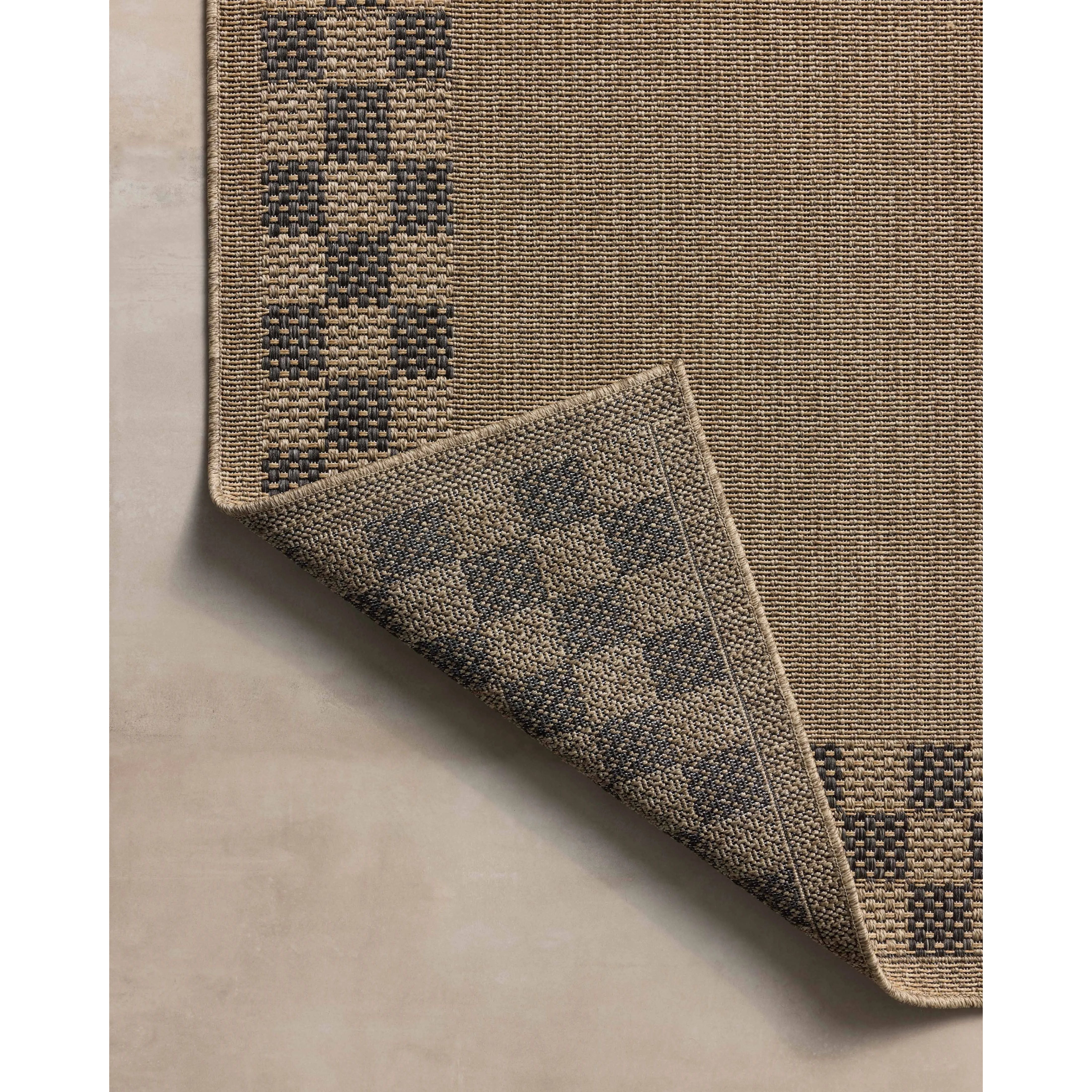 The Providence Collection is an indoor/outdoor rug with a woven-style design by Chris Loves Julia x Loloi. Providence is made of extra durable power-loomed polyester for versatile styling in patios, mudrooms, dining rooms, hallways, or more. Amethyst Home provides interior design, new home construction design consulting, vintage area rugs, and lighting in the Kansas City metro area.