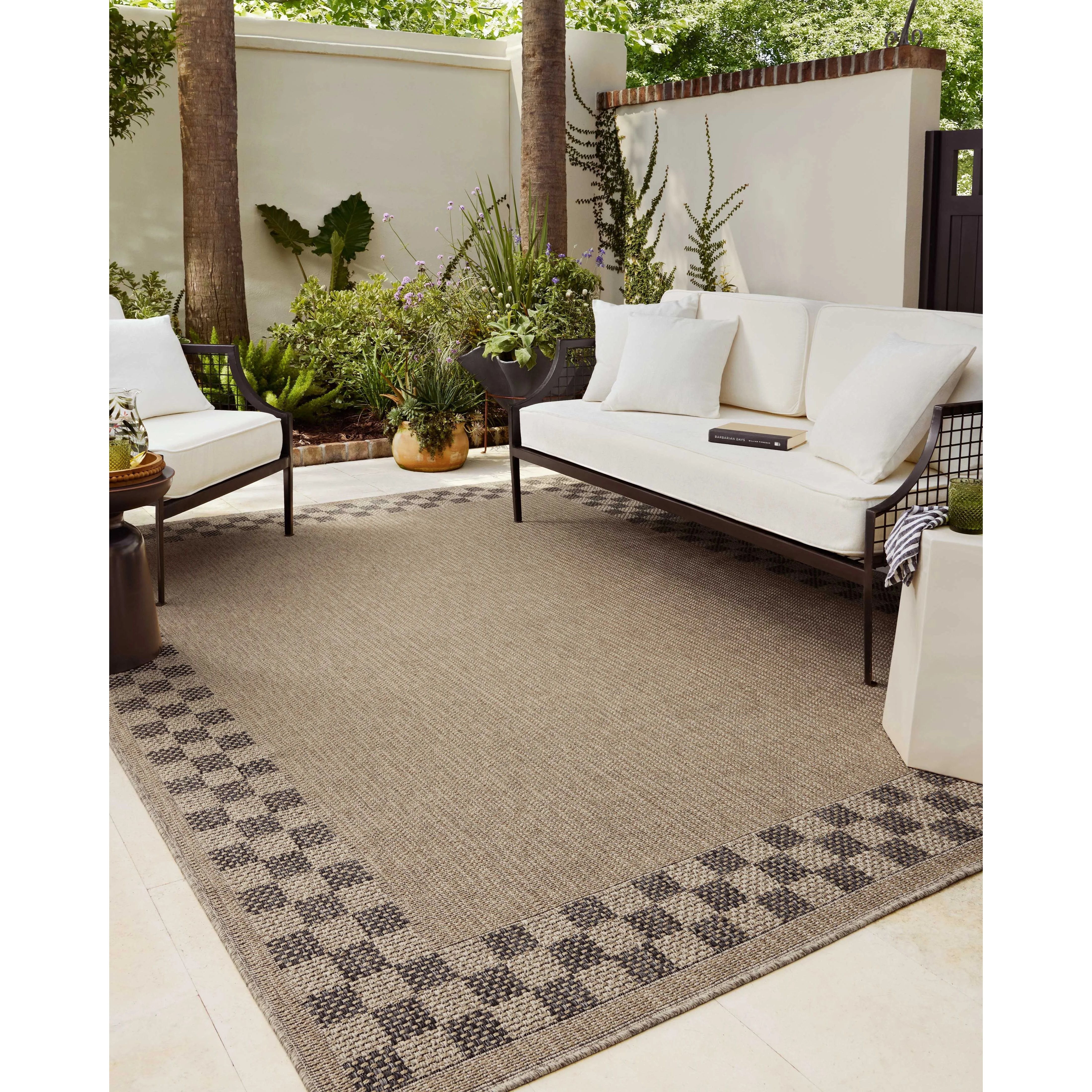 The Providence Collection is an indoor/outdoor rug with a woven-style design by Chris Loves Julia x Loloi. Providence is made of extra durable power-loomed polyester for versatile styling in patios, mudrooms, dining rooms, hallways, or more. Amethyst Home provides interior design, new home construction design consulting, vintage area rugs, and lighting in the Laguna Beach metro area.