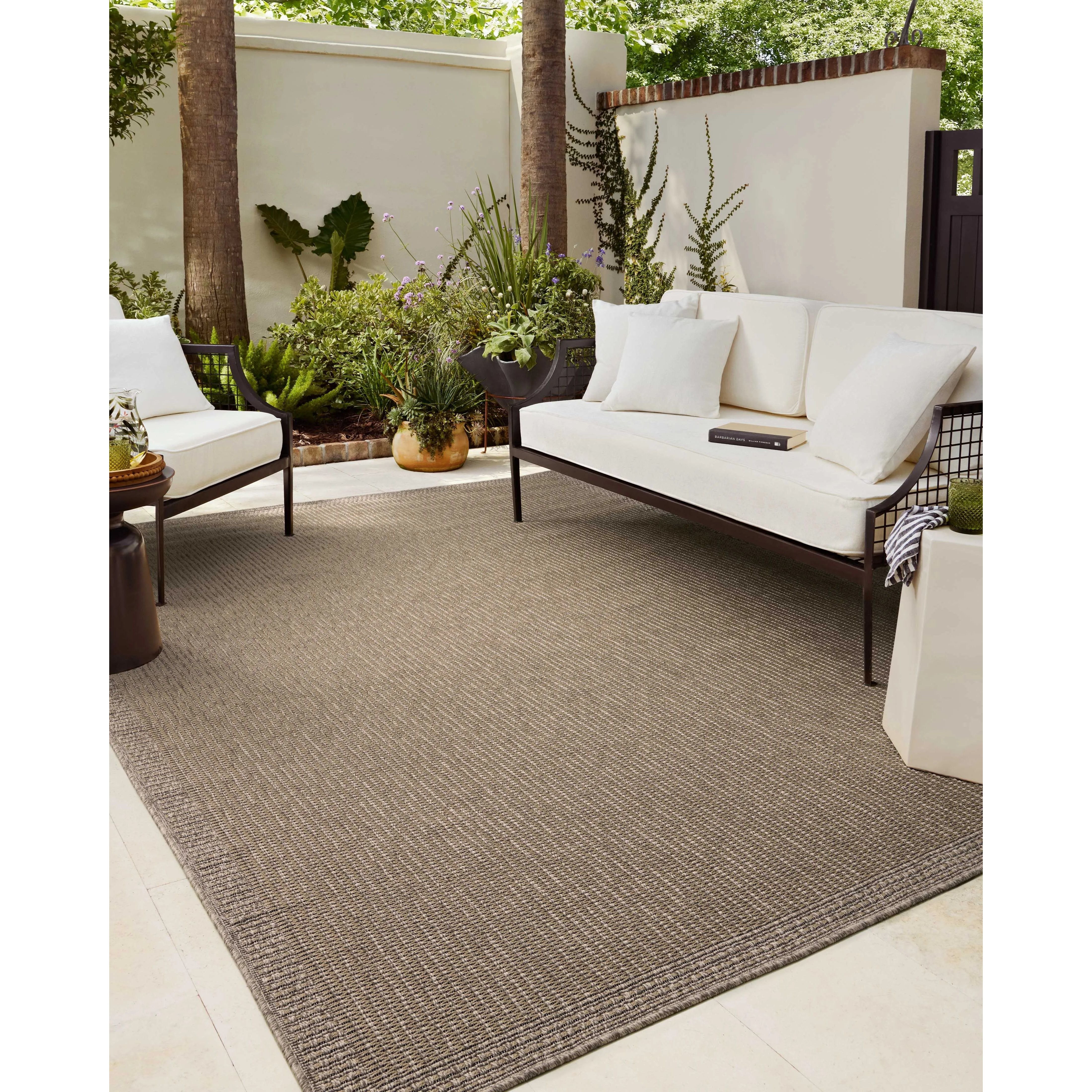 The Providence Collection is an indoor/outdoor rug with a woven-style design by Chris Loves Julia x Loloi. Providence is made of extra durable power-loomed polyester for versatile styling in patios, mudrooms, dining rooms, hallways, or more. Amethyst Home provides interior design, new home construction design consulting, vintage area rugs, and lighting in the Alpharetta metro area.