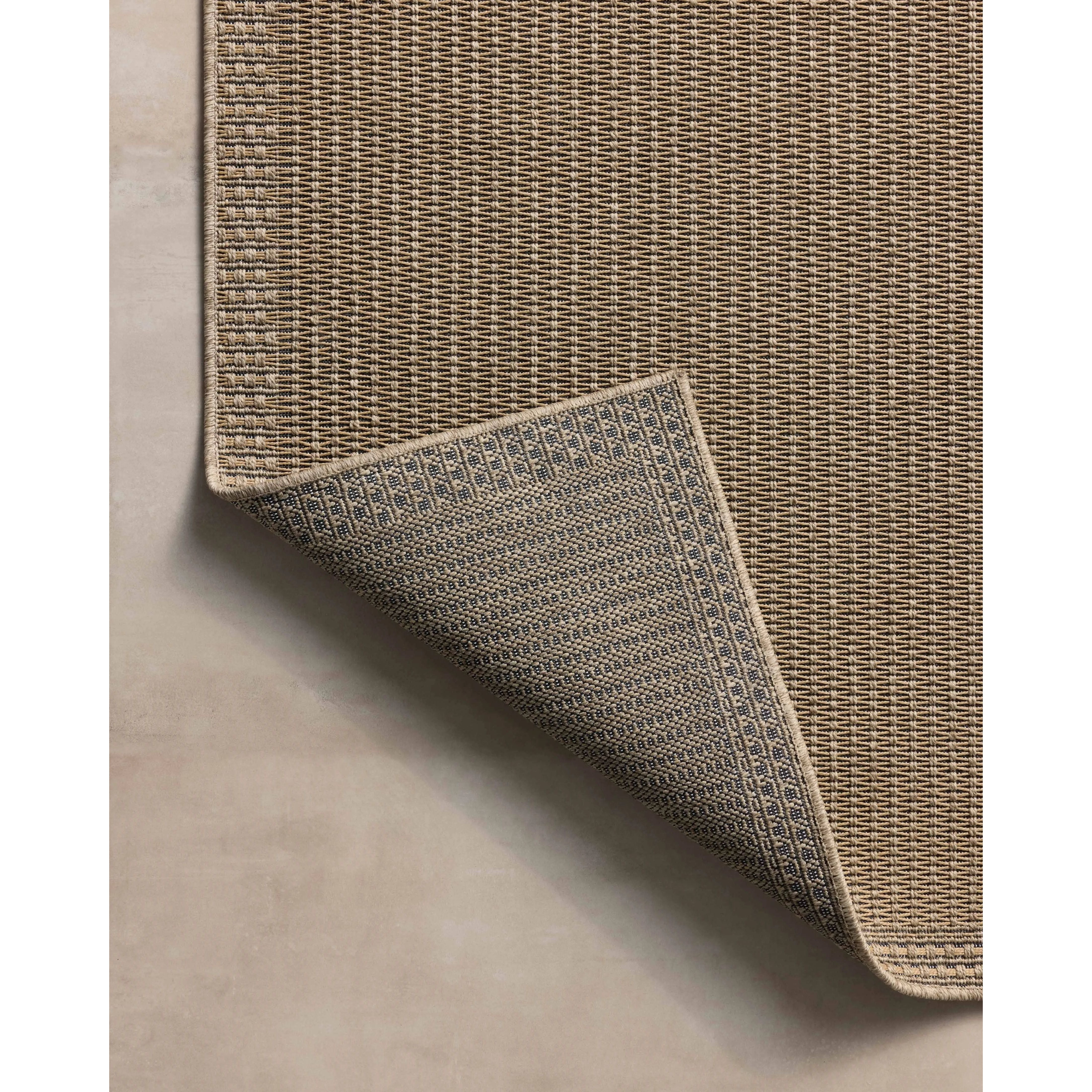 The Providence Collection is an indoor/outdoor rug with a woven-style design by Chris Loves Julia x Loloi. Providence is made of extra durable power-loomed polyester for versatile styling in patios, mudrooms, dining rooms, hallways, or more. Amethyst Home provides interior design, new home construction design consulting, vintage area rugs, and lighting in the Boston metro area.
