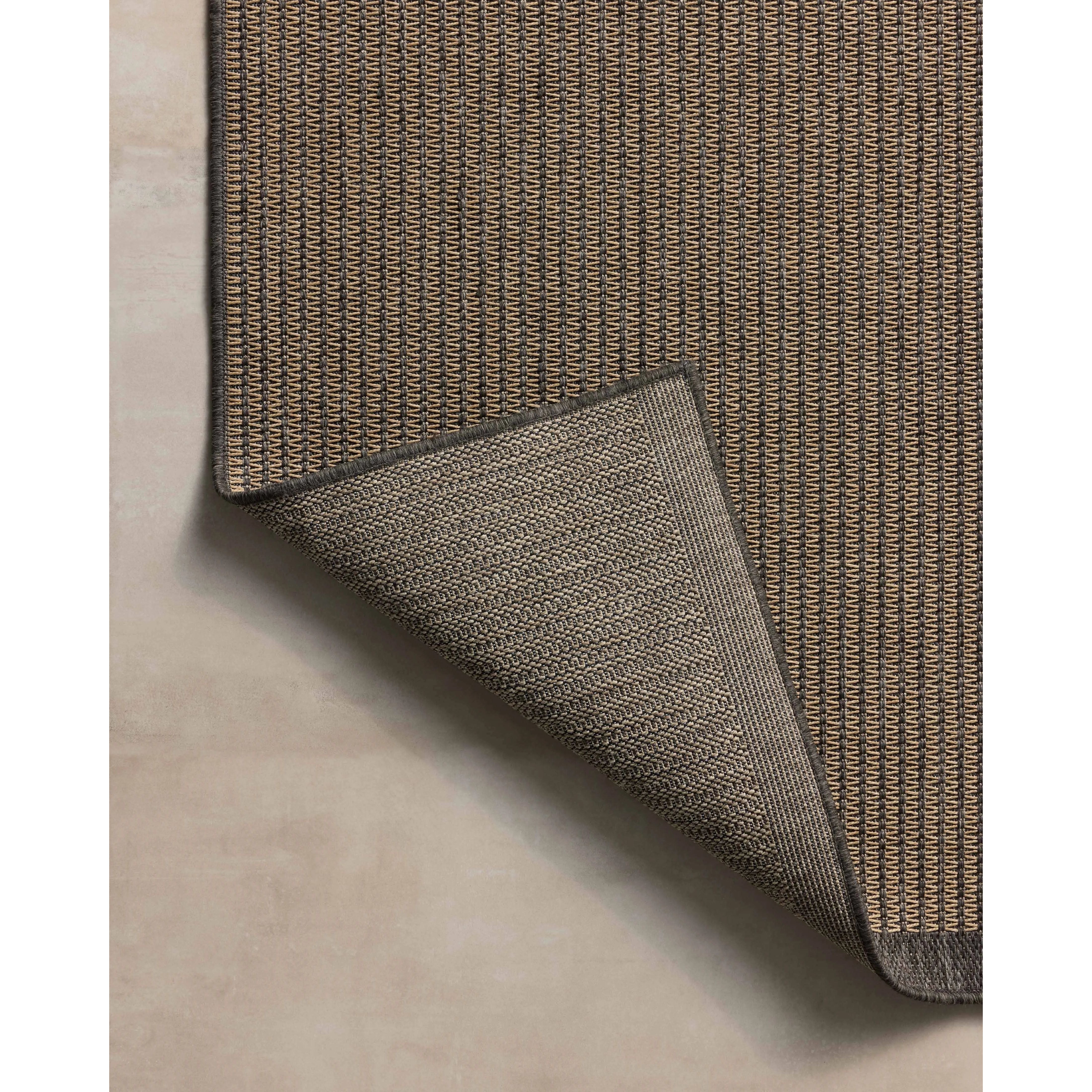 The Providence Collection is an indoor/outdoor rug with a woven-style design by Chris Loves Julia x Loloi. Providence is made of extra durable power-loomed polyester for versatile styling in patios, mudrooms, dining rooms, hallways, or more. Amethyst Home provides interior design, new home construction design consulting, vintage area rugs, and lighting in the Scottsdale metro area.