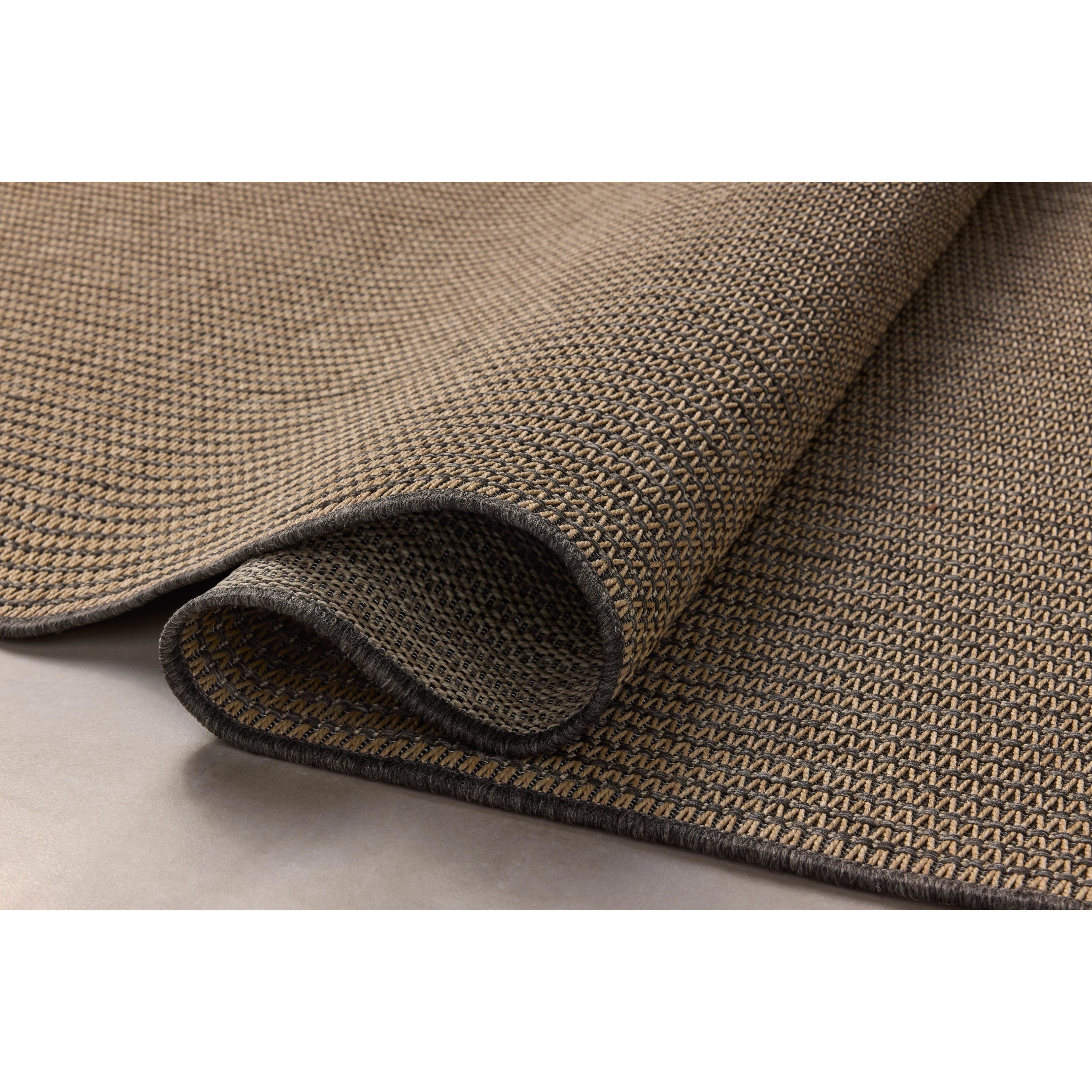 The Providence Collection is an indoor/outdoor rug with a woven-style design by Chris Loves Julia x Loloi. Providence is made of extra durable power-loomed polyester for versatile styling in patios, mudrooms, dining rooms, hallways, or more. Amethyst Home provides interior design, new home construction design consulting, vintage area rugs, and lighting in the Washington metro area.