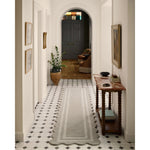 Featuring Chris Loves Julia × Loloi Scottie Fog / Ivory Rug by Loloi at Amethyst Home. The Scottie Collection from Chris Loves Julia x Loloi is a hand-tufted wool area rug with a playful scalloped edge and lower-pile, striped border for a touch of structure. The rugs overall pile is thick and plush, available in easygoing earth tones and neutral colorways. . Amethyst Home provides interior design, new home construction design consulting, vintage area rugs, and lighting in the Charlotte metro area.