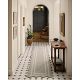 Featuring Chris Loves Julia × Loloi Scottie Fog / Ivory Rug by Loloi at Amethyst Home. The Scottie Collection from Chris Loves Julia x Loloi is a hand-tufted wool area rug with a playful scalloped edge and lower-pile, striped border for a touch of structure. The rugs overall pile is thick and plush, available in easygoing earth tones and neutral colorways. . Amethyst Home provides interior design, new home construction design consulting, vintage area rugs, and lighting in the Charlotte metro area.