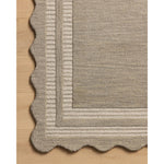 Featuring Chris Loves Julia × Loloi Scottie Fog / Ivory Rug by Loloi at Amethyst Home. The Scottie Collection from Chris Loves Julia x Loloi is a hand-tufted wool area rug with a playful scalloped edge and lower-pile, striped border for a touch of structure. The rugs overall pile is thick and plush, available in easygoing earth tones and neutral colorways. . Amethyst Home provides interior design, new home construction design consulting, vintage area rugs, and lighting in the Park City metro area.