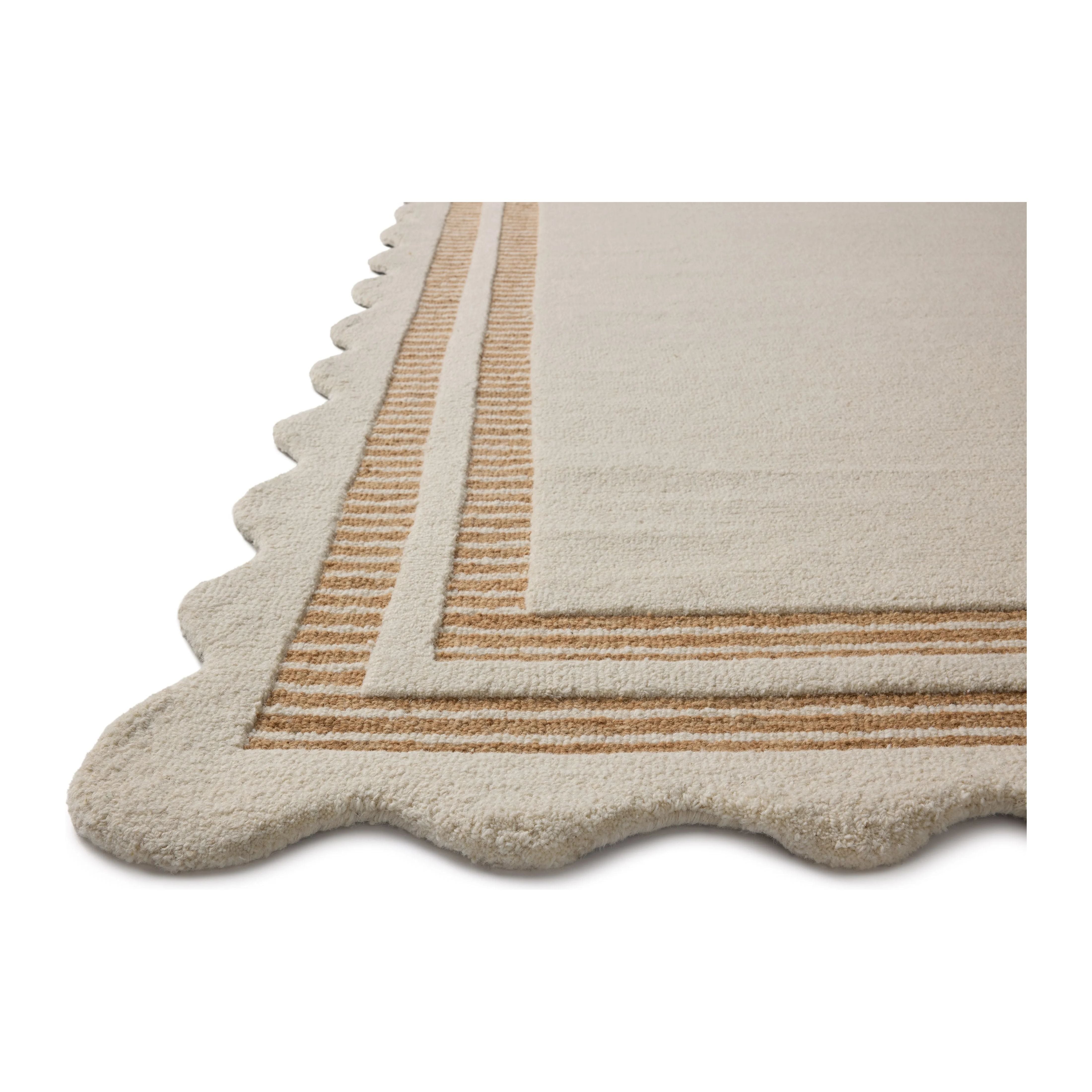 Featuring Chris Loves Julia × Loloi Scottie Ivory / Rust Rug by Loloi at Amethyst Home. The Scottie Collection from Chris Loves Julia x Loloi is a hand-tufted wool area rug with a playful scalloped edge and lower-pile, striped border for a touch of structure. The rugs overall pile is thick and plush, available in easygoing earth tones and neutral colorways. T. Amethyst Home provides interior design, new home construction design consulting, vintage area rugs, and lighting in the Houston metro area.
