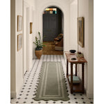 Featuring Chris Loves Julia × Loloi Scottie Olive / Pebble Rug by Loloi at Amethyst Home. The Scottie Collection from Chris Loves Julia x Loloi is a hand-tufted wool area rug with a playful scalloped edge and lower-pile, striped border for a touch of structure. The rugs overall pile is thick and plush, available in easygoing earth tones and neutral colorwa. Amethyst Home provides interior design, new home construction design consulting, vintage area rugs, and lighting in the Des Moines metro area.