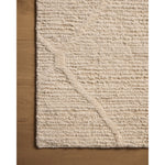 Featuring Cline Ivory Rug by Loloi at Amethyst Home. The Cline Collection is a hand-woven area rug with loose, organic raised patterns across a pleasantly chunky pile. The rug's palette is inspired by color-flecked stones, making it a dynamic neutral in living rooms, bedrooms, and more. This collection is made of 100% wool in India and GoodWeave-certified, . Amethyst Home provides interior design, new home construction design consulting, vintage area rugs, and lighting in the San Diego metro area.