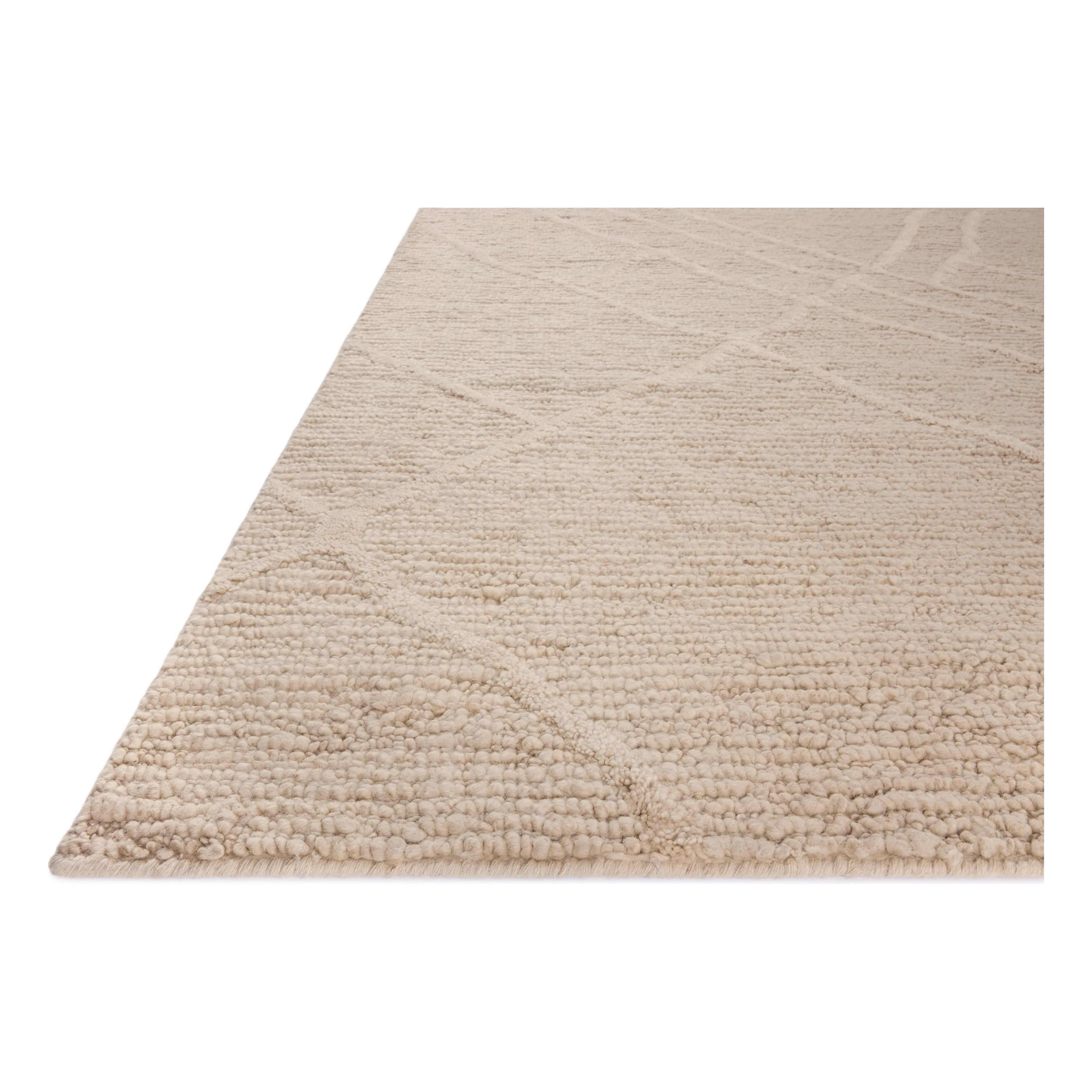 Featuring Cline Ivory Rug by Loloi at Amethyst Home. The Cline Collection is a hand-woven area rug with loose, organic raised patterns across a pleasantly chunky pile. The rug's palette is inspired by color-flecked stones, making it a dynamic neutral in living rooms, bedrooms, and more. This collection is made of 100% wool in India and GoodWeave-certifi. Amethyst Home provides interior design, new home construction design consulting, vintage area rugs, and lighting in the Winter Garden metro area.