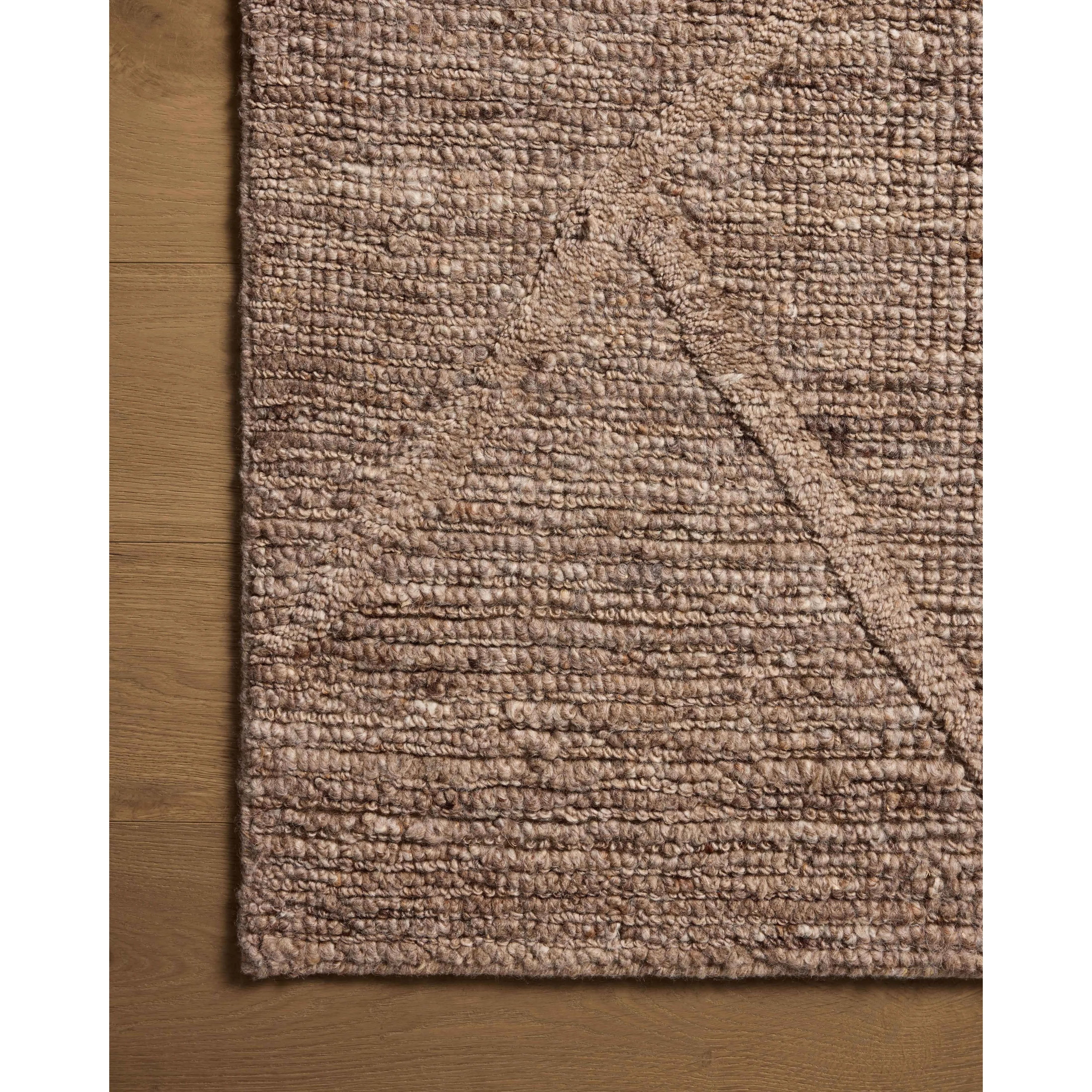 Featuring Cline Mocha Rug by Loloi at Amethyst Home. The Cline Collection is a hand-woven area rug with loose, organic raised patterns across a pleasantly chunky pile. The rug's palette is inspired by color-flecked stones, making it a dynamic neutral in living rooms, bedrooms, and more. This collection is made of 100% wool in India and GoodWeave-certifi. Amethyst Home provides interior design, new home construction design consulting, vintage area rugs, and lighting in the Winter Garden metro area.
