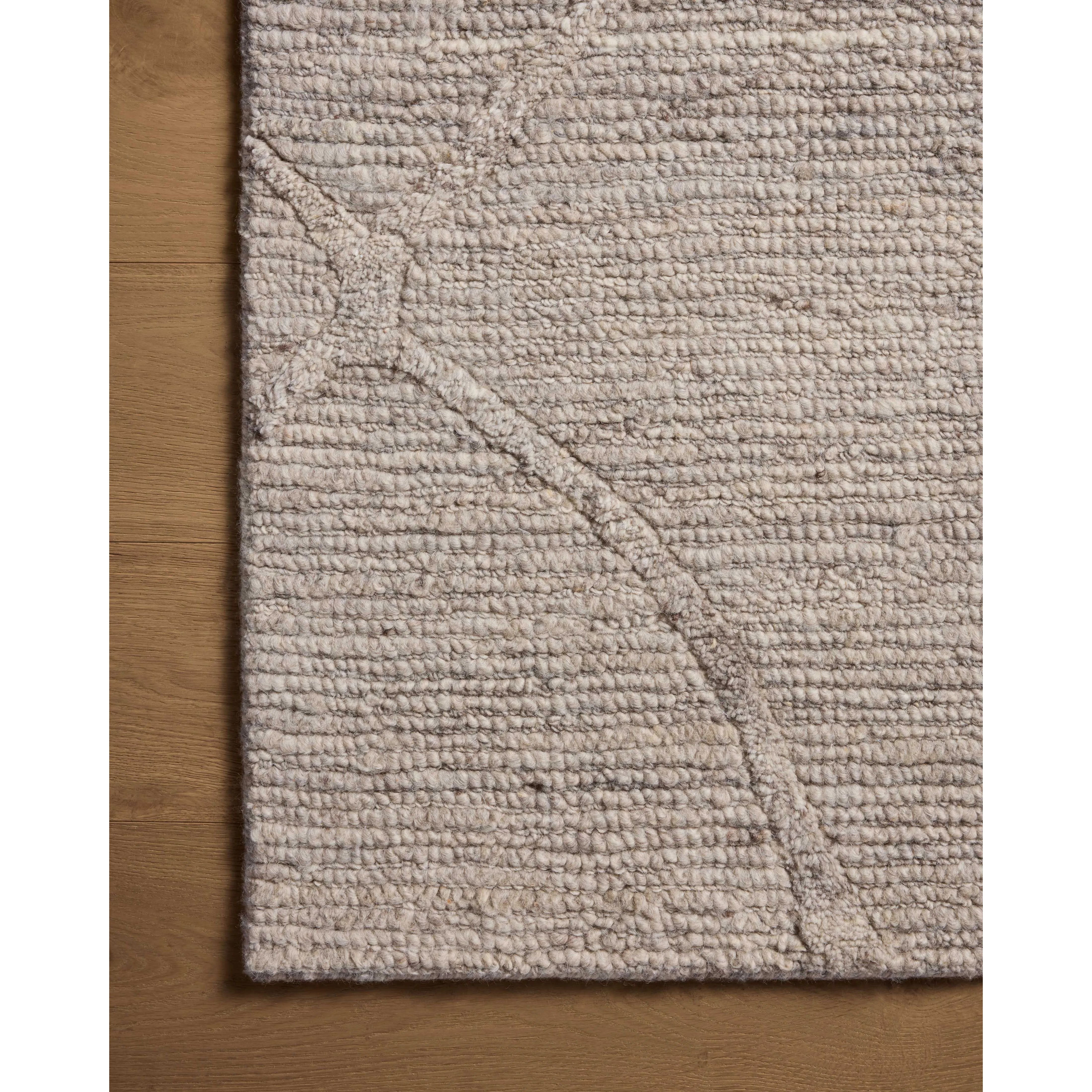 Featuring Cline Stone Rug by Loloi at Amethyst Home. The Cline Collection is a hand-woven area rug with loose, organic raised patterns across a pleasantly chunky pile. The rug's palette is inspired by color-flecked stones, making it a dynamic neutral in living rooms, bedrooms, and more. This collection is made of 100% wool in India and GoodWeave-certified,. Amethyst Home provides interior design, new home construction design consulting, vintage area rugs, and lighting in the Washington metro area.