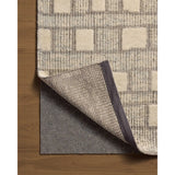 Featuring David Jean Stoffer x Loloi Grey Hand-Knotted Rug by Loloi at Amethyst Home. Unexpected stripes trace along the David Collection, a hand-knotted area rug with a plush, luxurious presence. Abstract patterns are carved into the design for a richly textured pile that's satisfying to sink into. This collection is made of 100% wool in India and GoodWea. Amethyst Home provides interior design, new home construction design consulting, vintage area rugs, and lighting in the Alpharetta metro area.